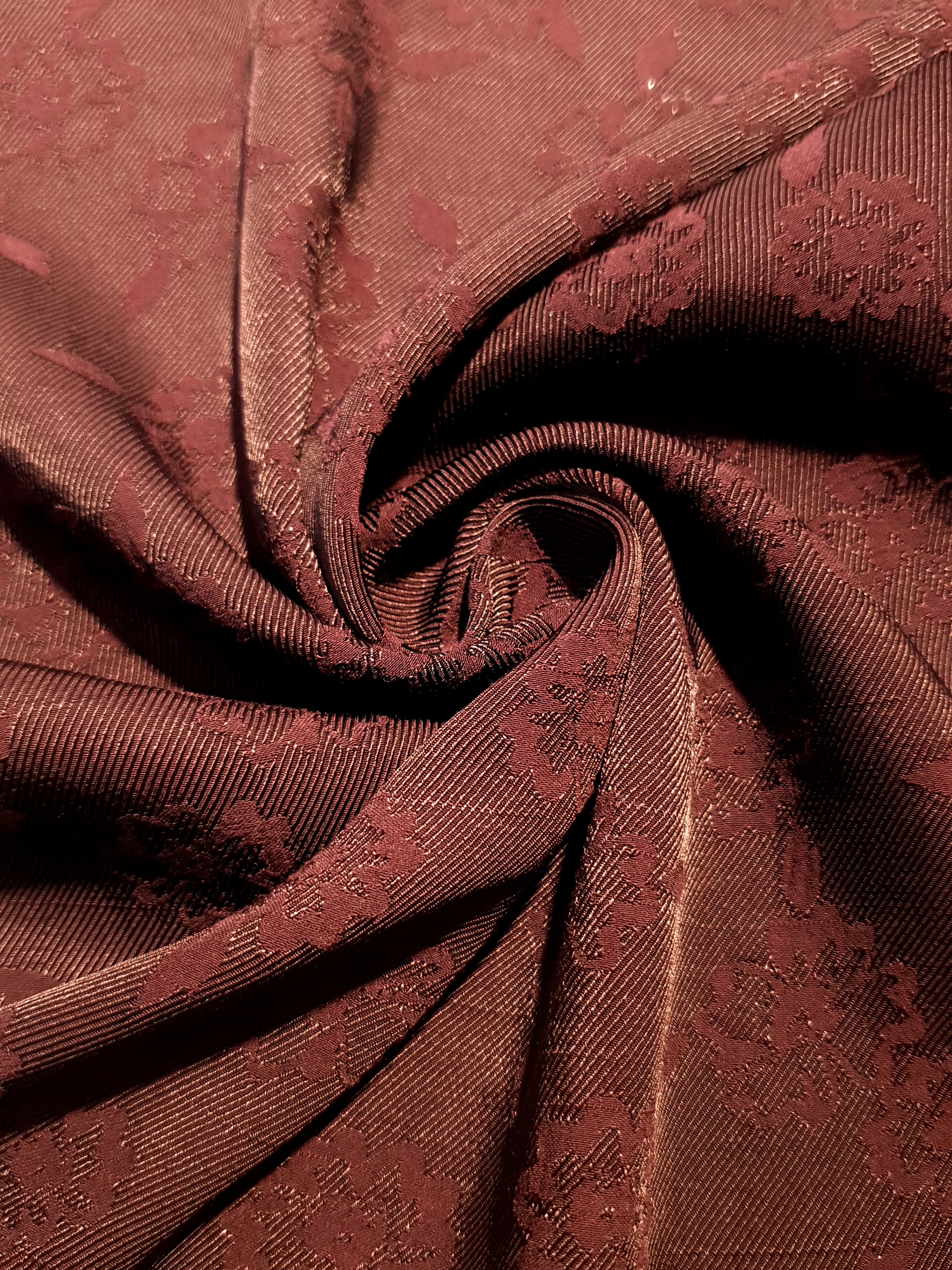 Pansy flower rayon jacquard drape view with structured movement.