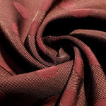 Drape detail of polka dot rayon jacquard for blouses and skirts.