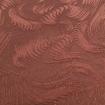 Close detail of swirl motif rayon jacquard with woven texture.