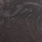 Close detail of structured swirl jacquard with rayon viscose texture.
