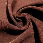 Drape detail of swirl motif rayon jacquard for dresses and skirts.