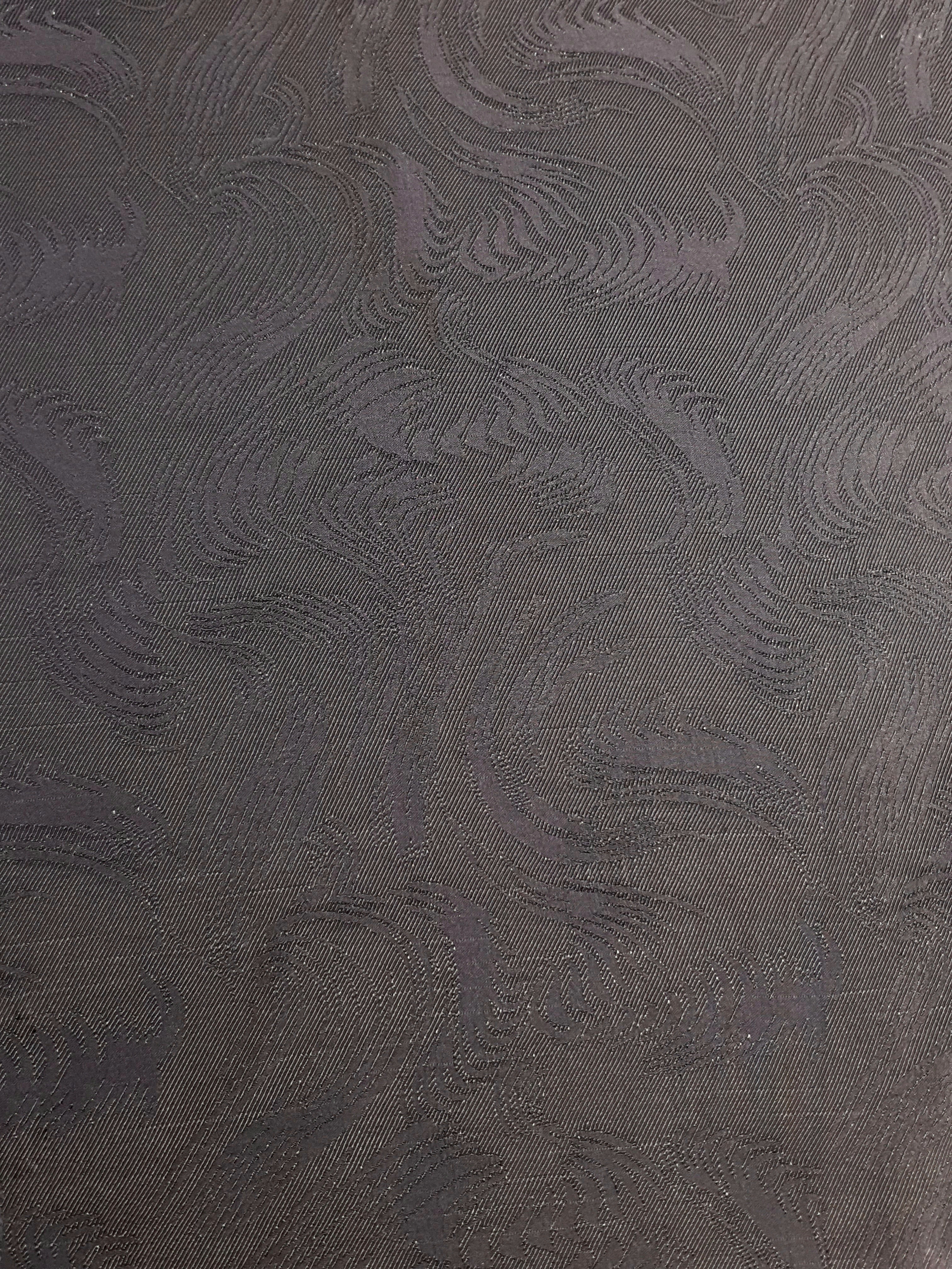 Full view of structured swirl jacquard fabric for garment planning.