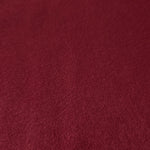 Close-up texture of Deep Burgundy sandwashed silky polyamide fabric
