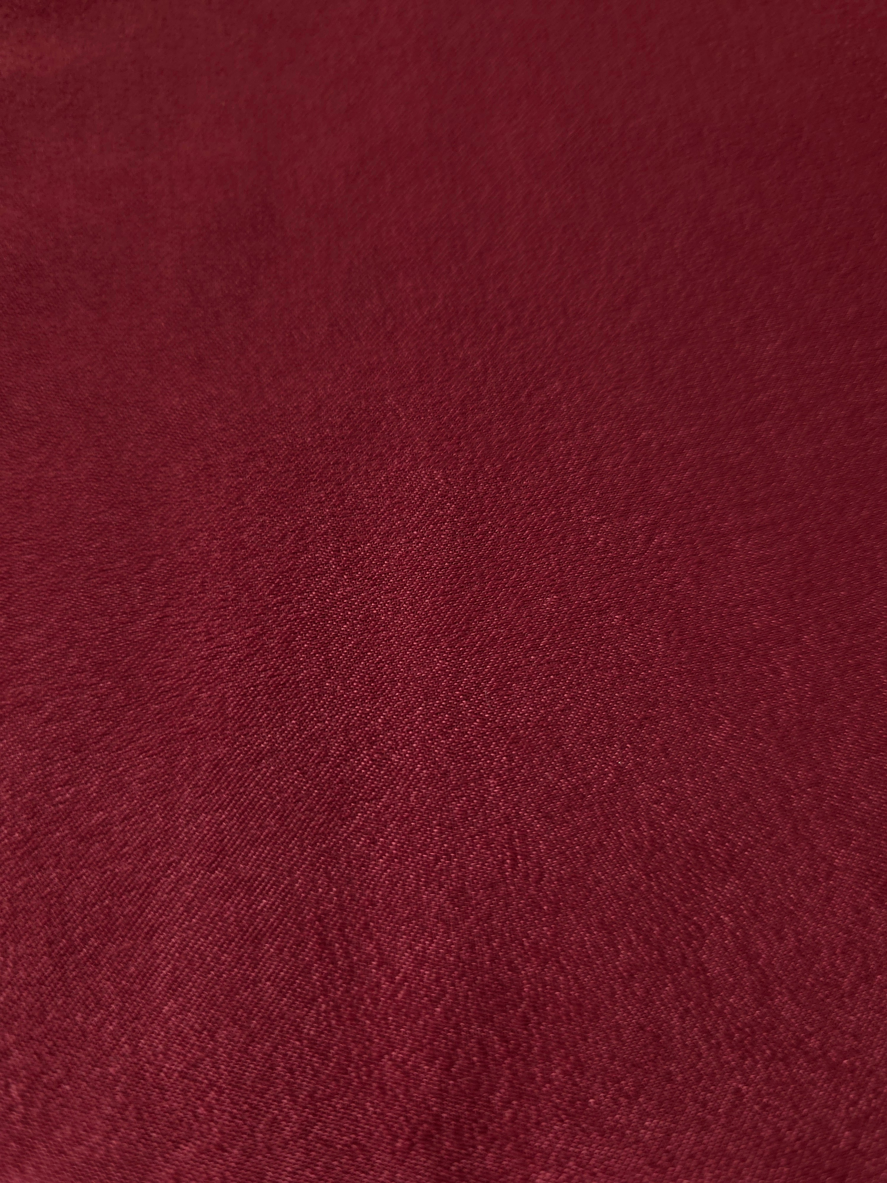 Close-up texture of Deep Burgundy sandwashed silky polyamide fabric
