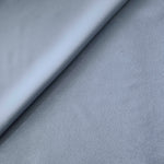 Close-up texture of Silver Blue sandwashed silky polyamide fabric