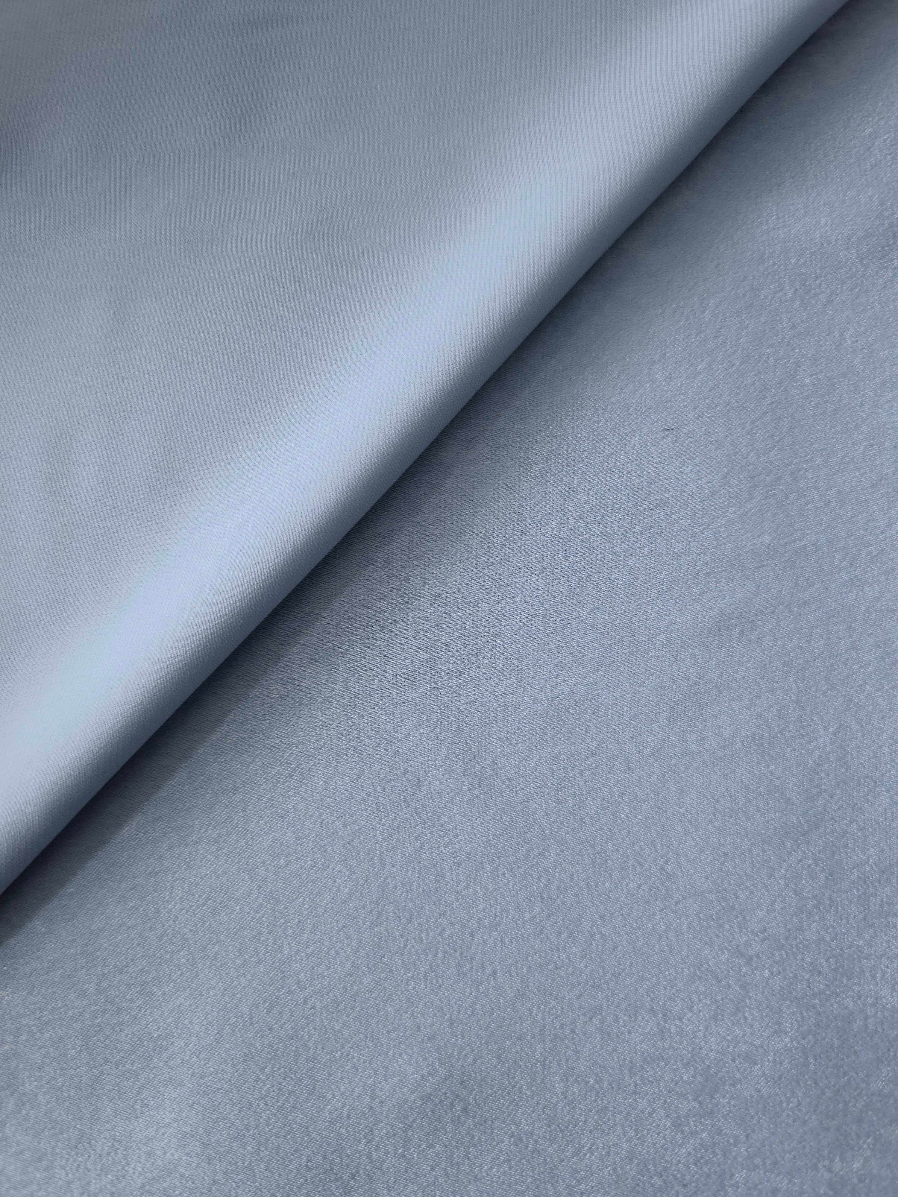 Close-up texture of Silver Blue sandwashed silky polyamide fabric