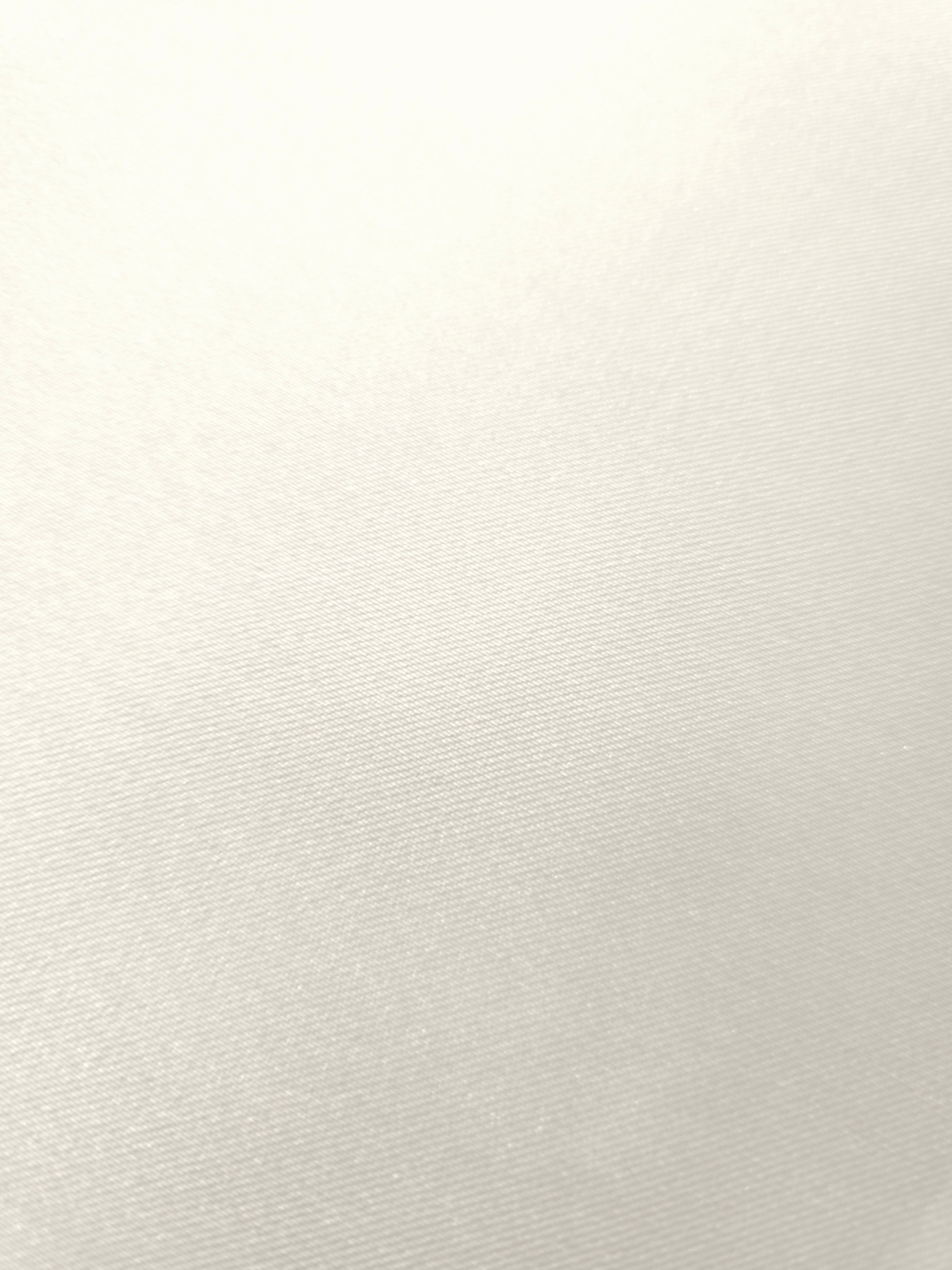 Surface view of Cloud White silky satin captures its polished sheen for veil edging, bridal accessories, bow details and refined event styling.