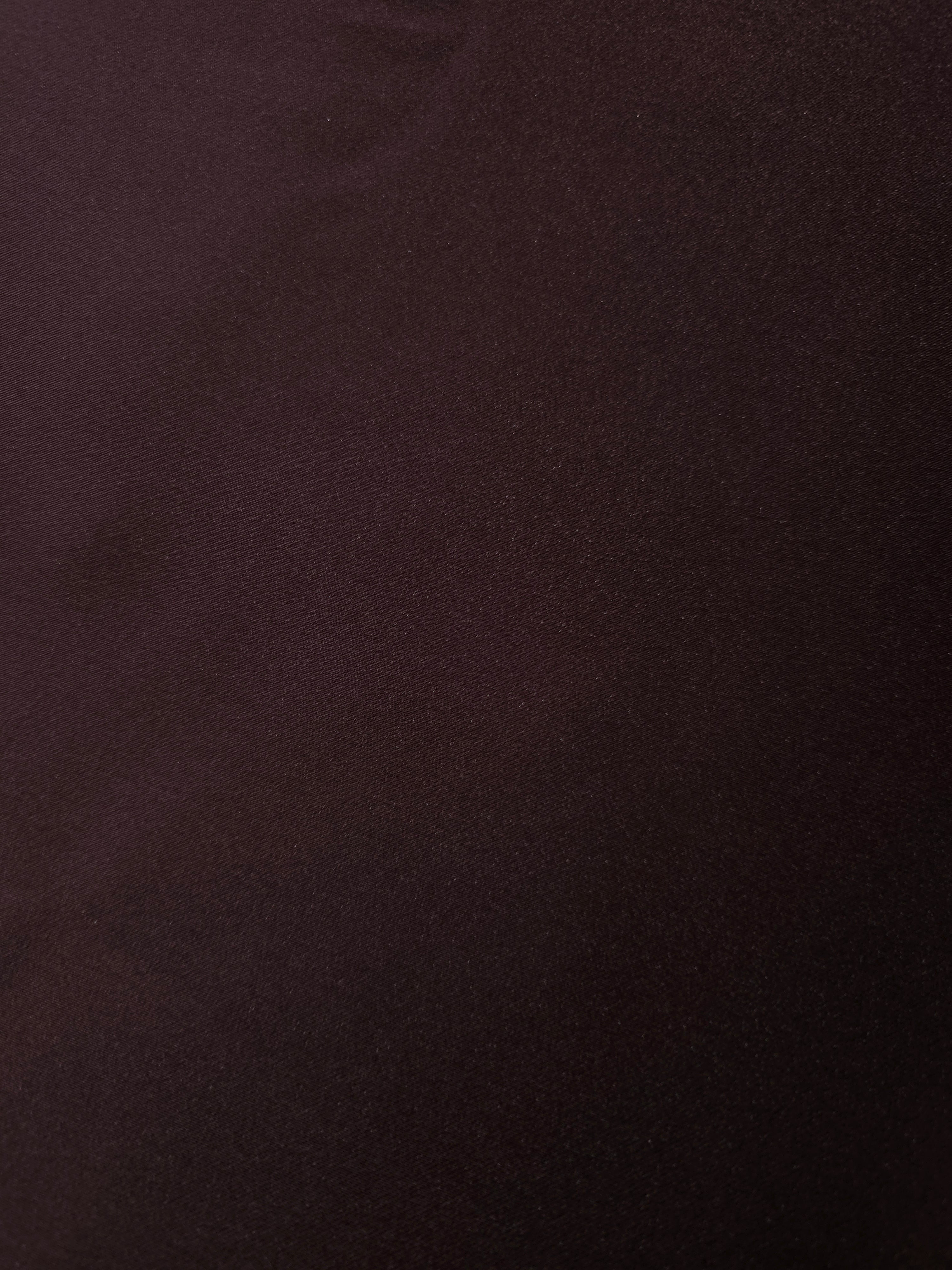Surface detail of Deep Purple satin highlights its saturated shine for scarves, clutch coverings and high-impact formal accessories.