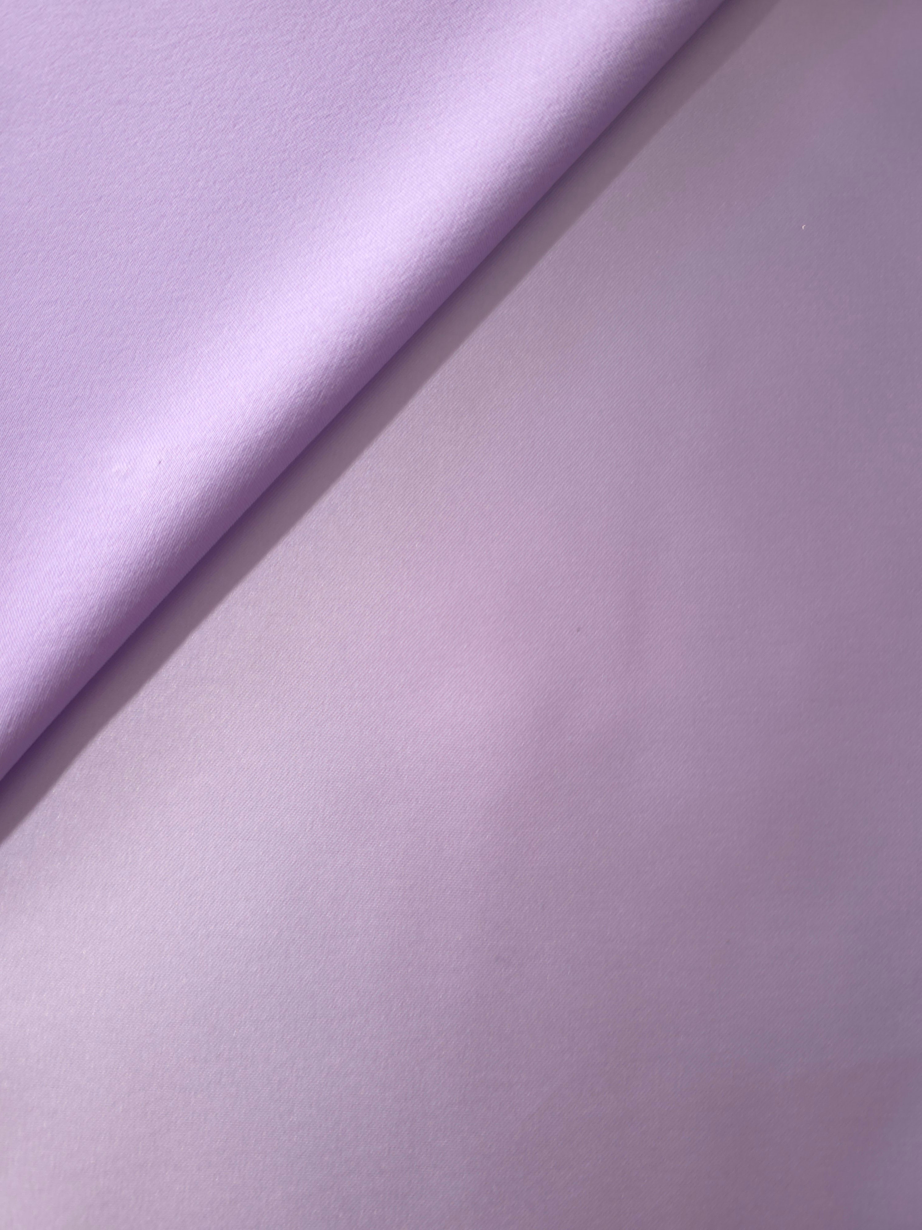 Lilac Lavender satin in fold detail reveals delicate highlights along the smooth face for romantic bodices, pleated skirt panels and formal accents.