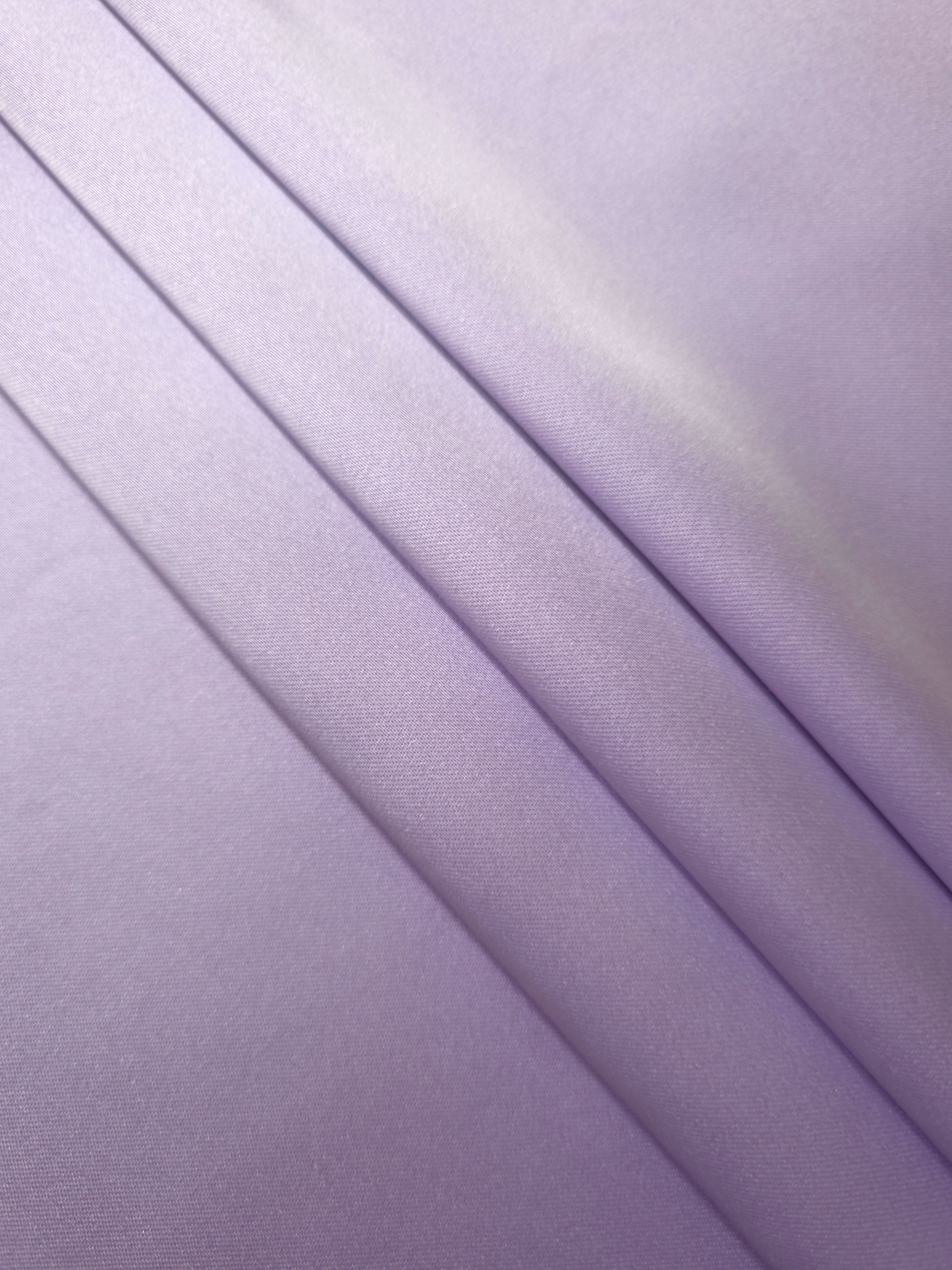 Soft folds of Lilac Lavender silky satin create a gentle fluid look for slip dresses, feminine blouses and bridal getting-ready robes.