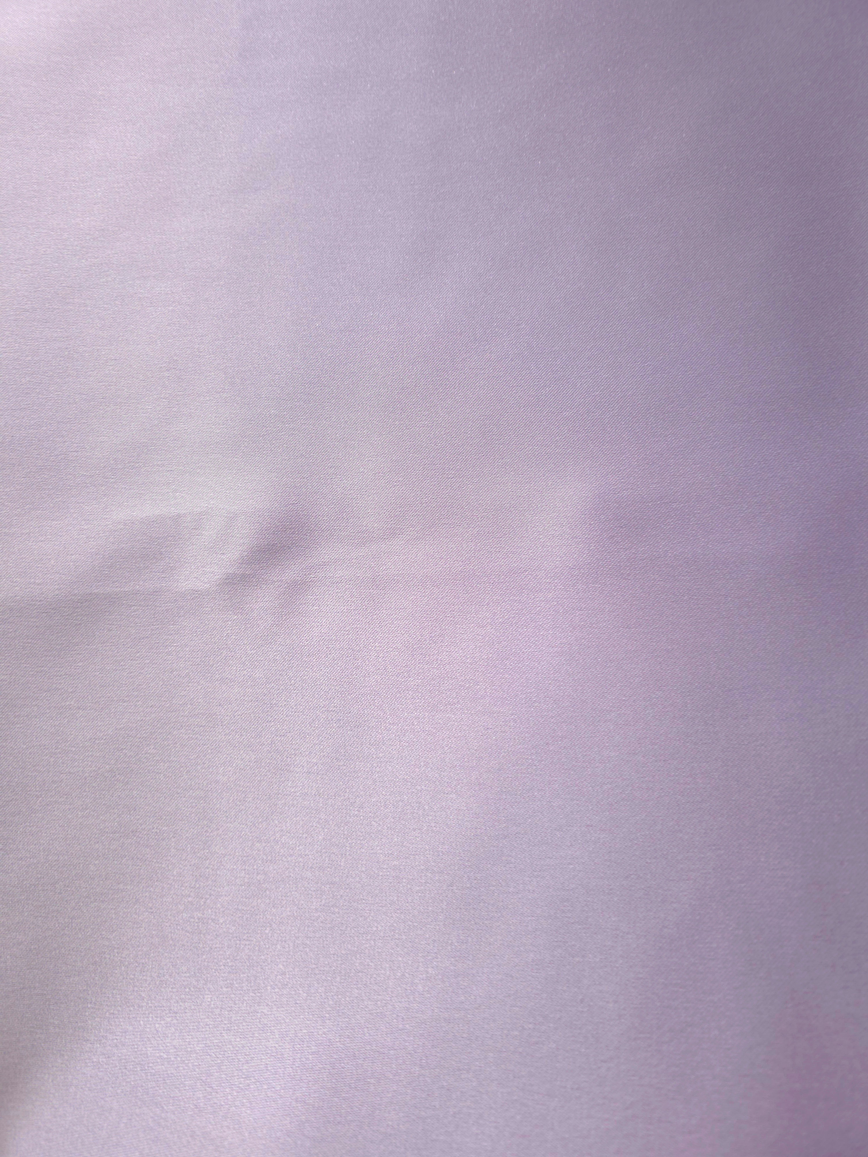 Close texture view of Lilac Lavender silky satin demonstrates its sleek lustrous finish for camisoles, blouse inserts and smooth garment linings.