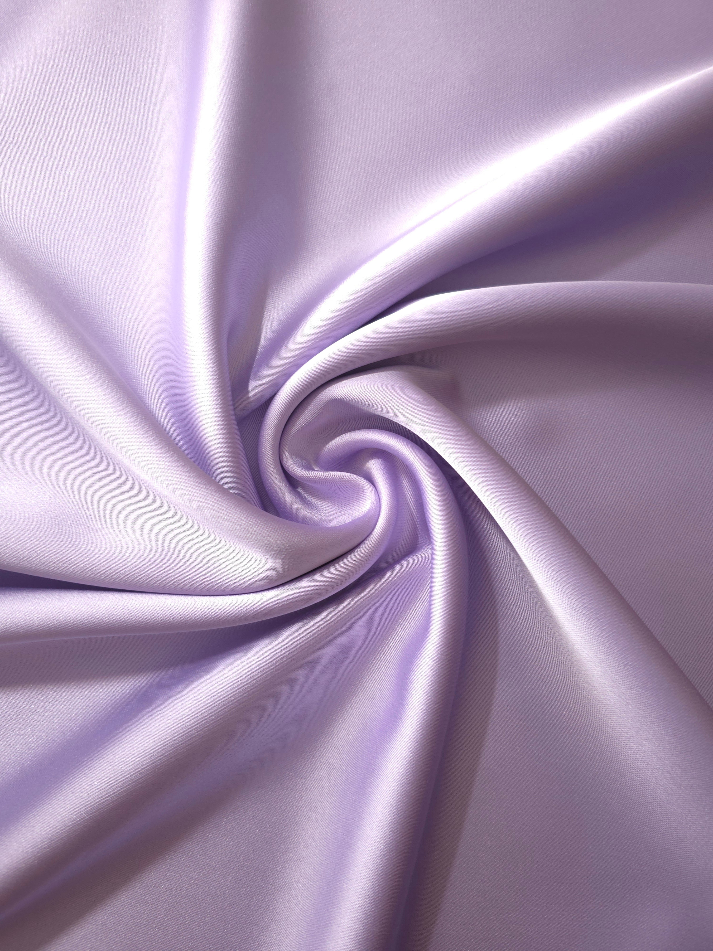 Lilac Lavender satin in a twist drape captures graceful shimmer and flow for prom dresses, cowl necklines and softly draped evening skirts.