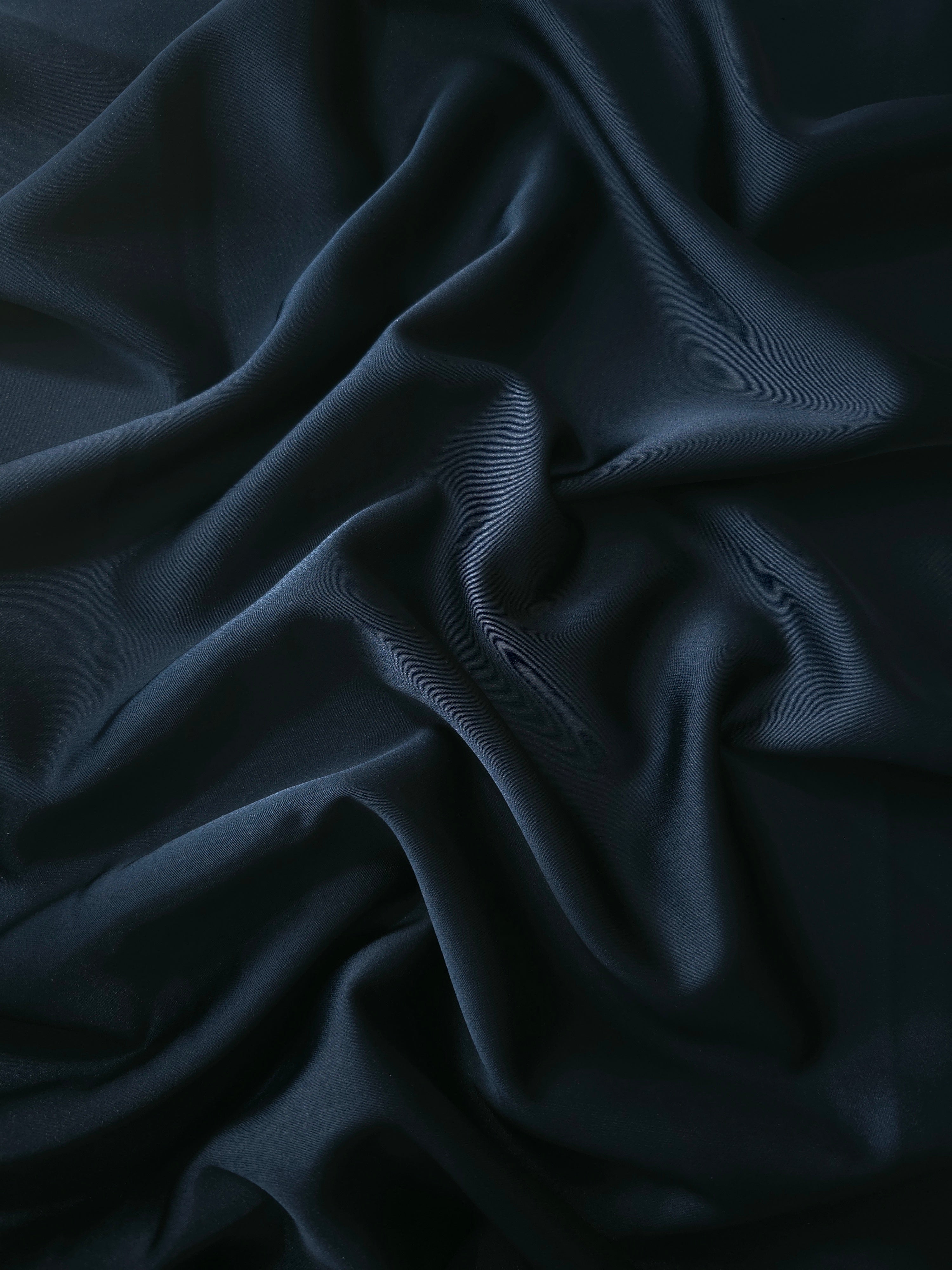 Royal Navy silky satin in a deep flowing drape shows sophisticated sheen for formal gowns, evening dresses and tailored occasion skirts.