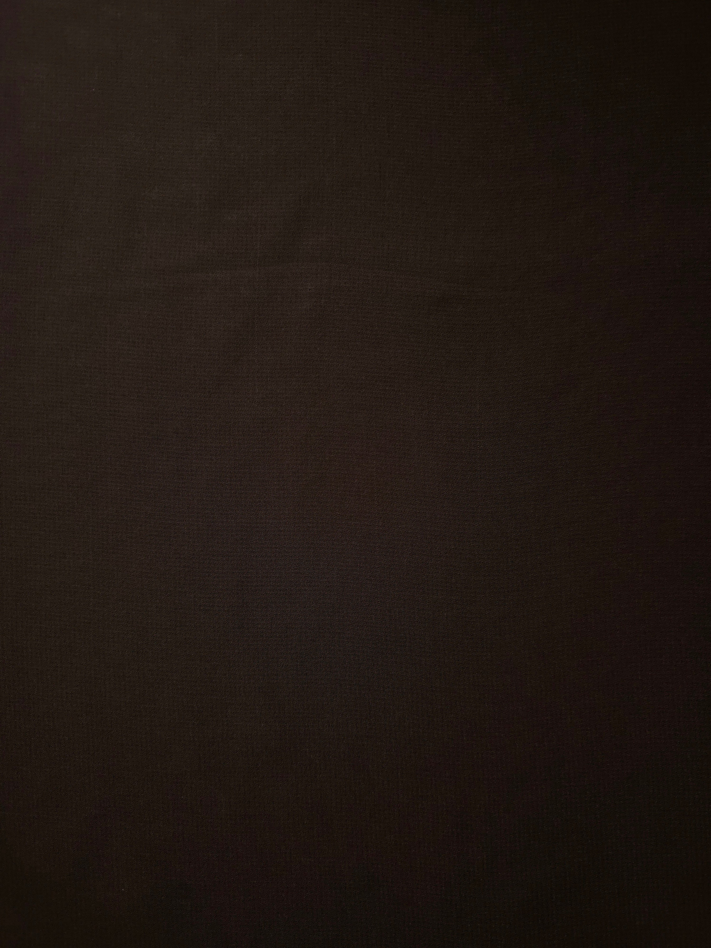 Flat view of Dark Espresso Brown stretch chiffon, showing a smooth airy face suited to autumn blouses, wrap skirts and sophisticated overlays.