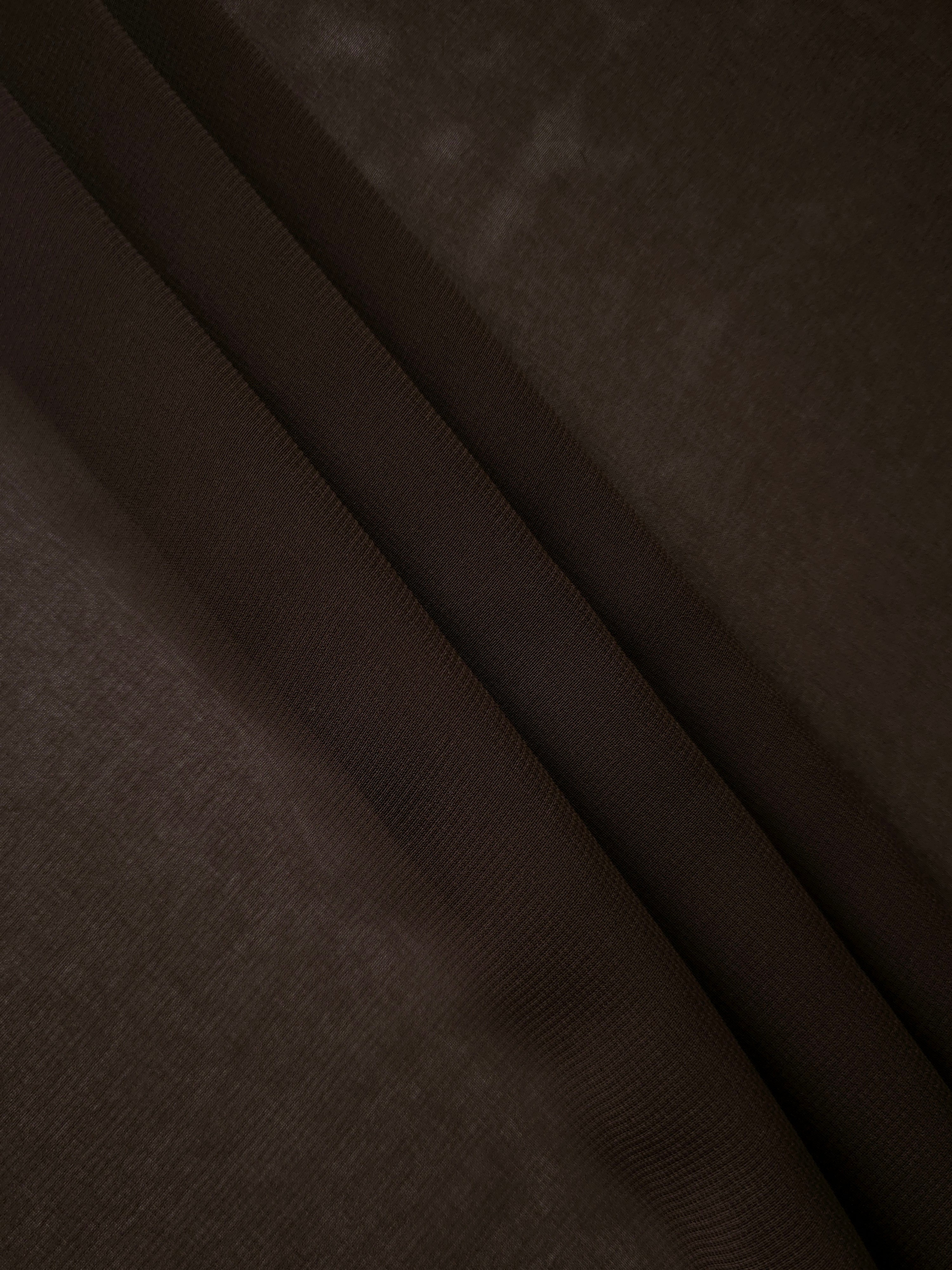 Dark Espresso Brown silky stretch chiffon stacked in soft layers, revealing airy volume for tiered skirts, modest dress layers and rich neutral overlays.