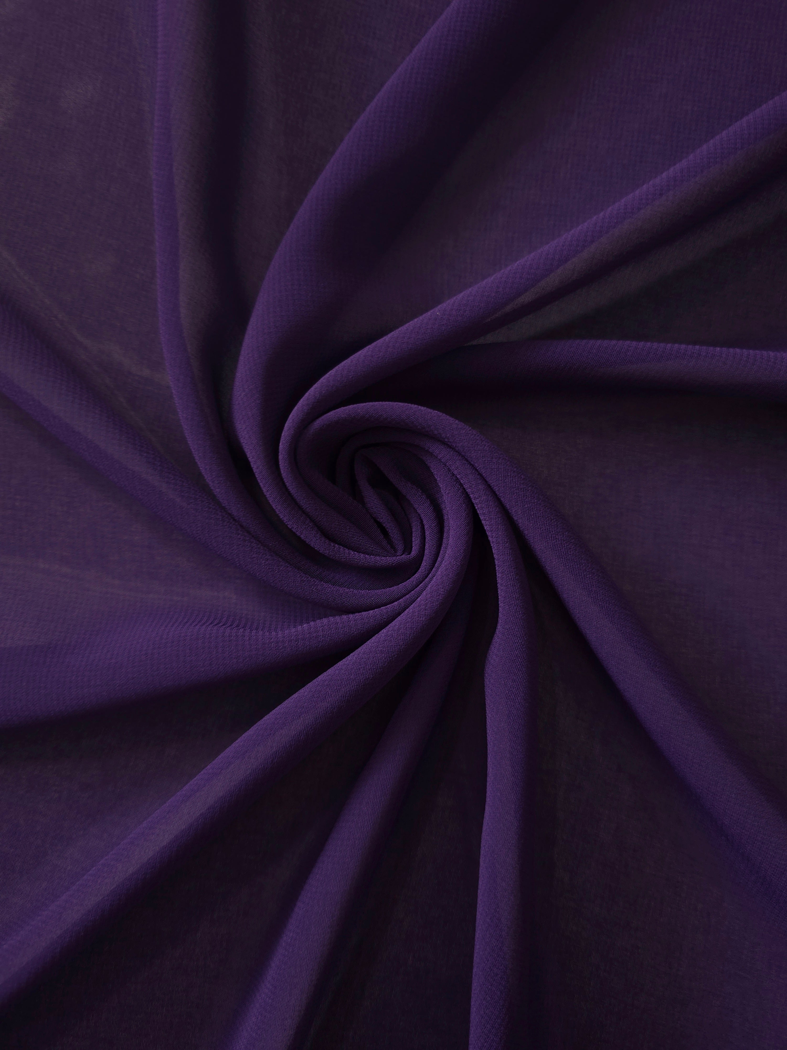 Deep Aubergine stretch chiffon arranged in a swirl, emphasizing airy movement for wraps, gathered dress panels and romantic formal layers.