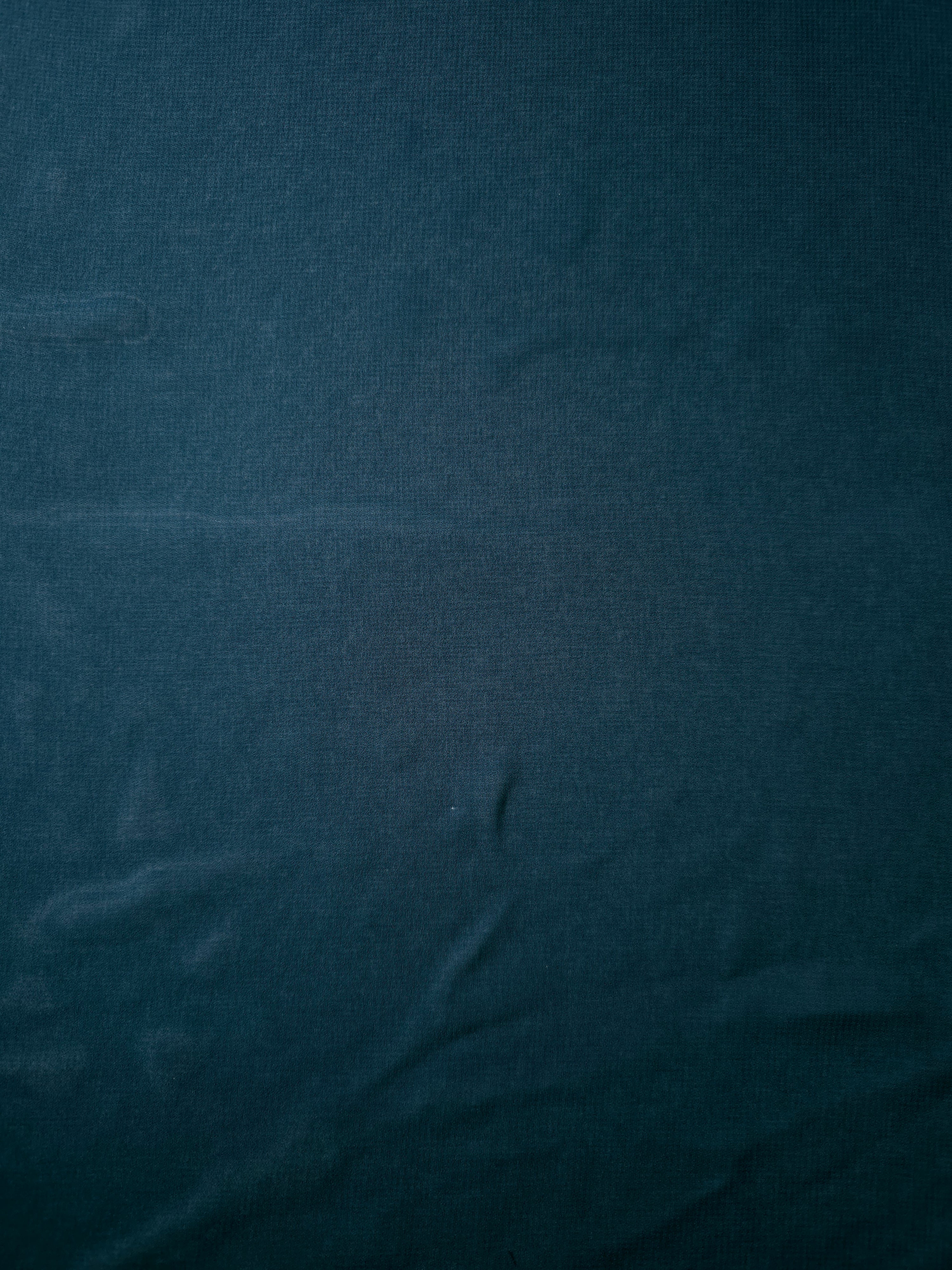 Flat view of Deep Petrol Teal stretch chiffon, showing a smooth airy face suited to formal dresses, statement blouses and teal skirt overlays.
