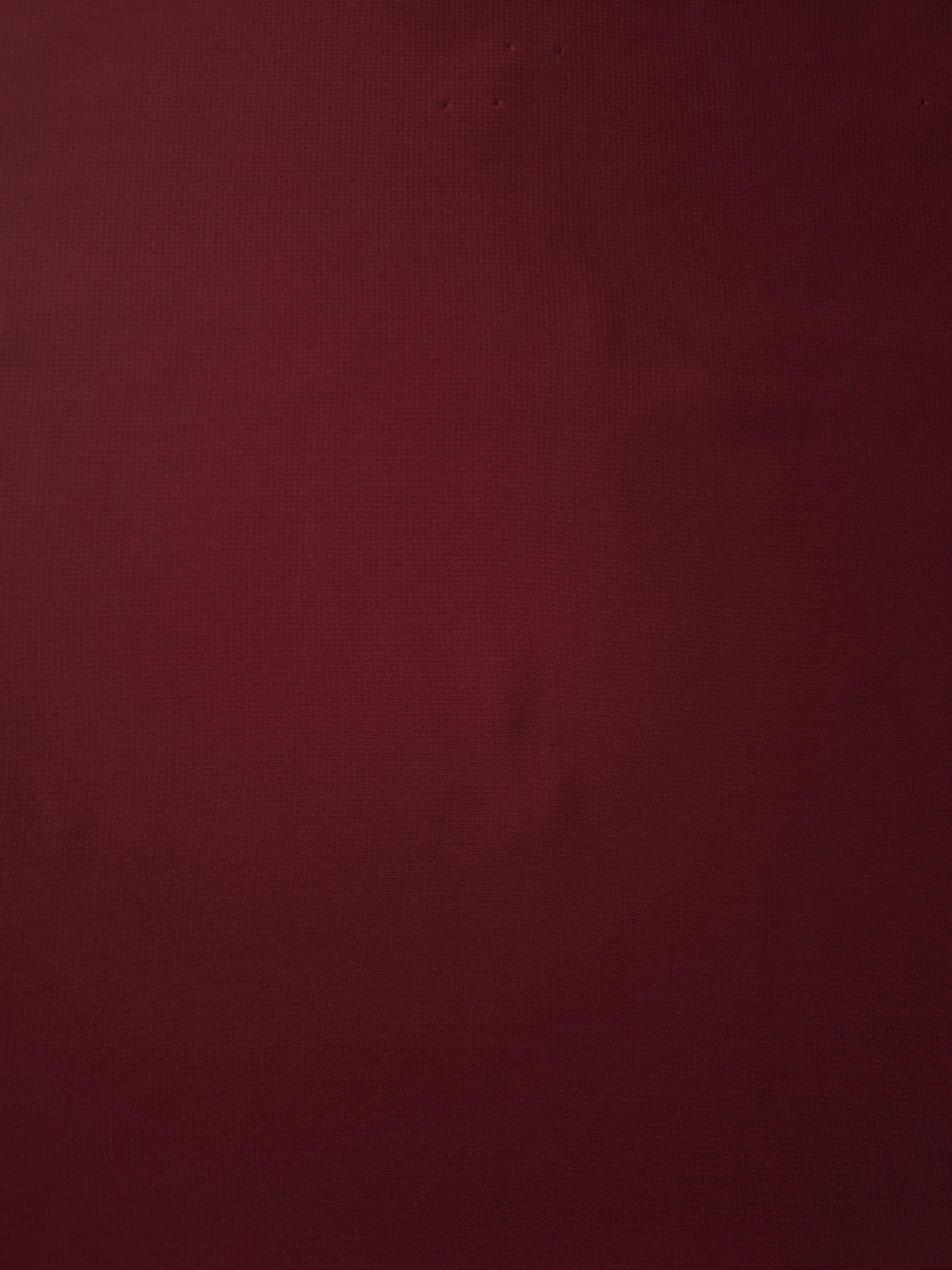 Garnet Wine stretch chiffon fabric in a full surface view, with soft transparency for eveningwear, formal blouses and wine-toned skirt overlays.