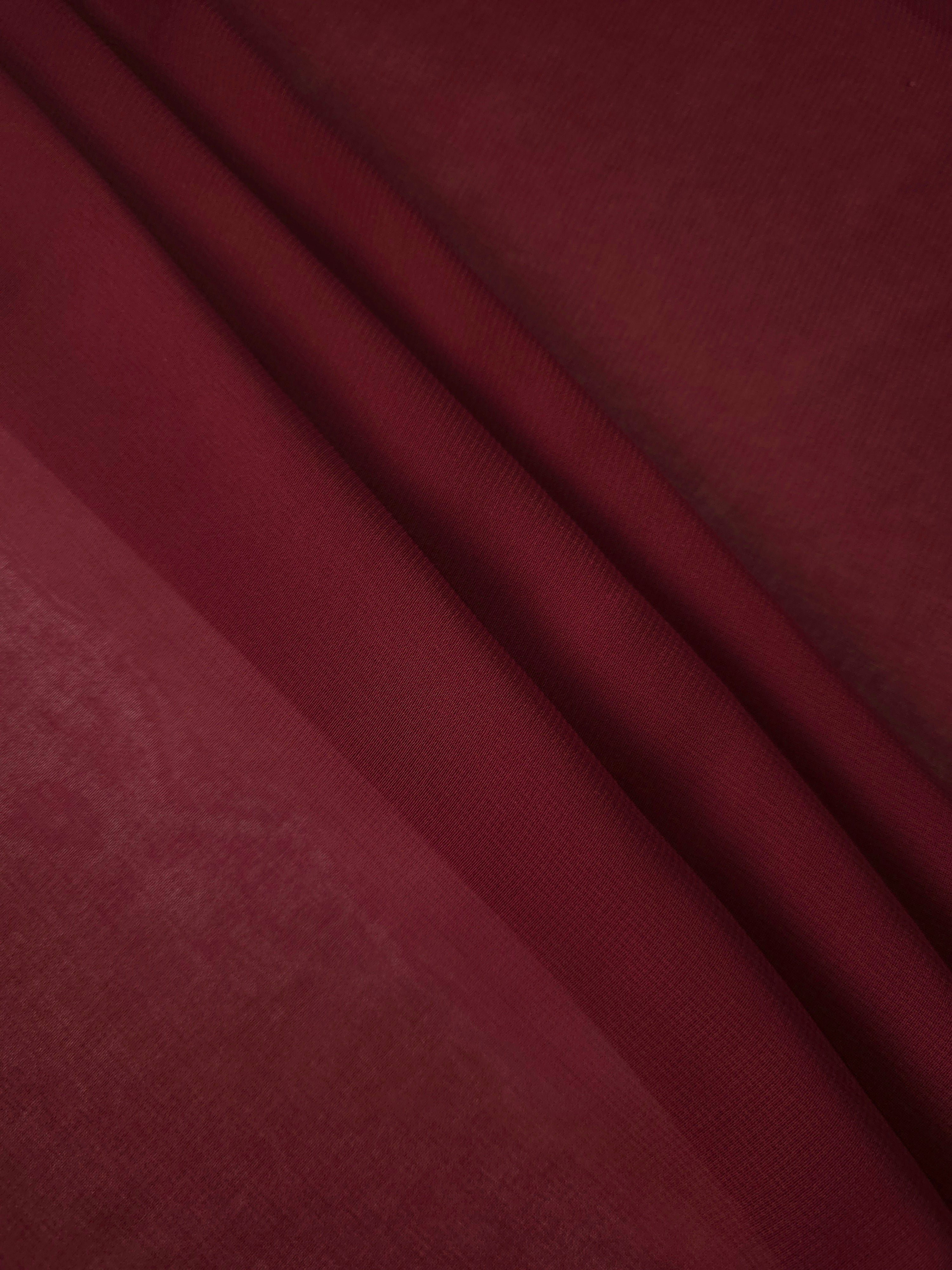 Layered Garnet Wine chiffon stretch fabric displays soft depth and flowing structure for tiered skirts, capelets and richly layered occasionwear.