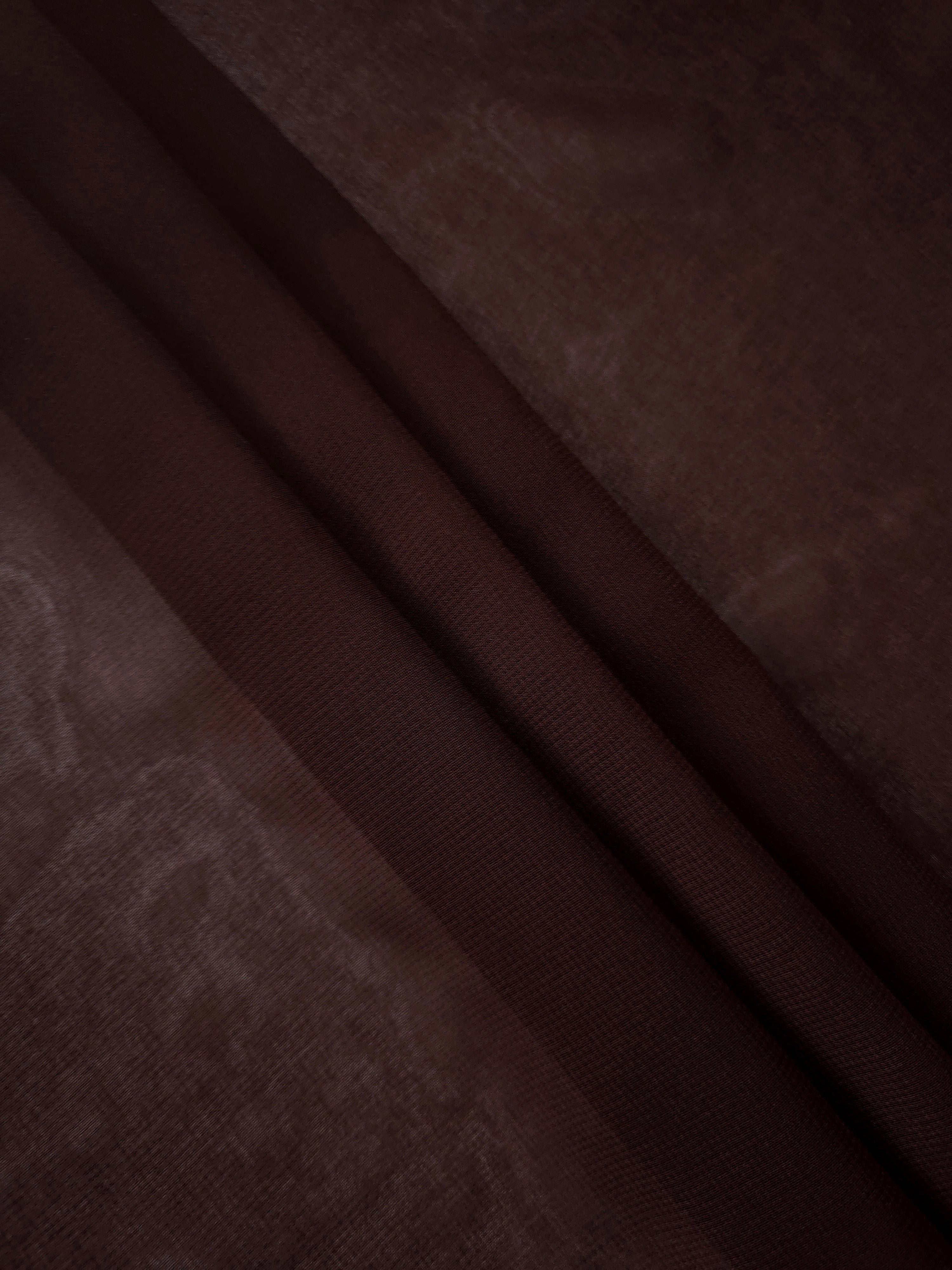 Layered folds of Mahogany Brown stretch chiffon show depth and translucency for tiered skirts, cape details and warm-toned occasion layers.