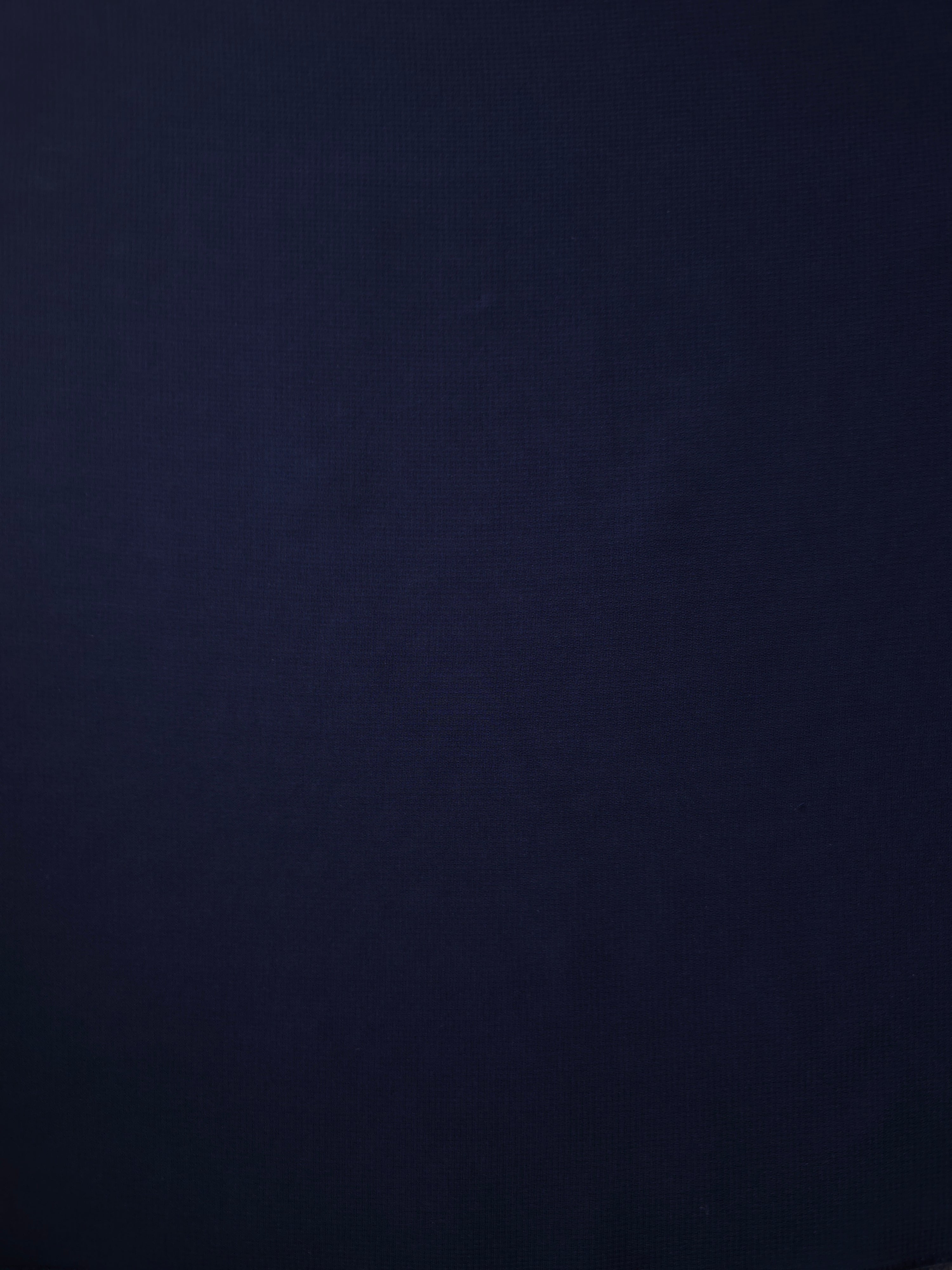 Flat view of Midnight Navy stretch chiffon, showing a smooth airy face suited to evening blouses, maxi skirts and formal overlays.