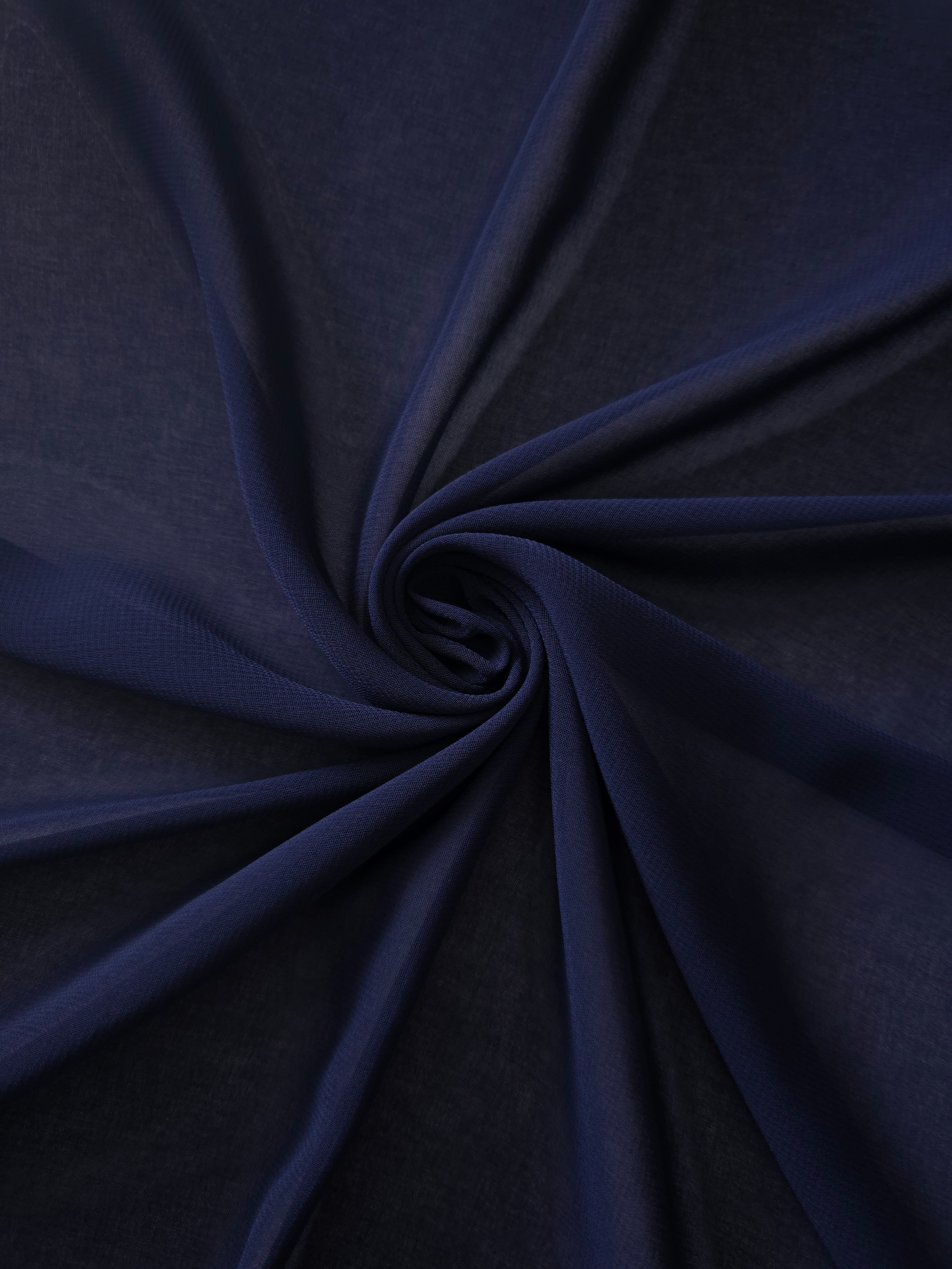 Swirled Midnight Navy silky stretch chiffon shows soft motion and fluid drape for prom dress layers, elegant wraps and softly gathered panels.