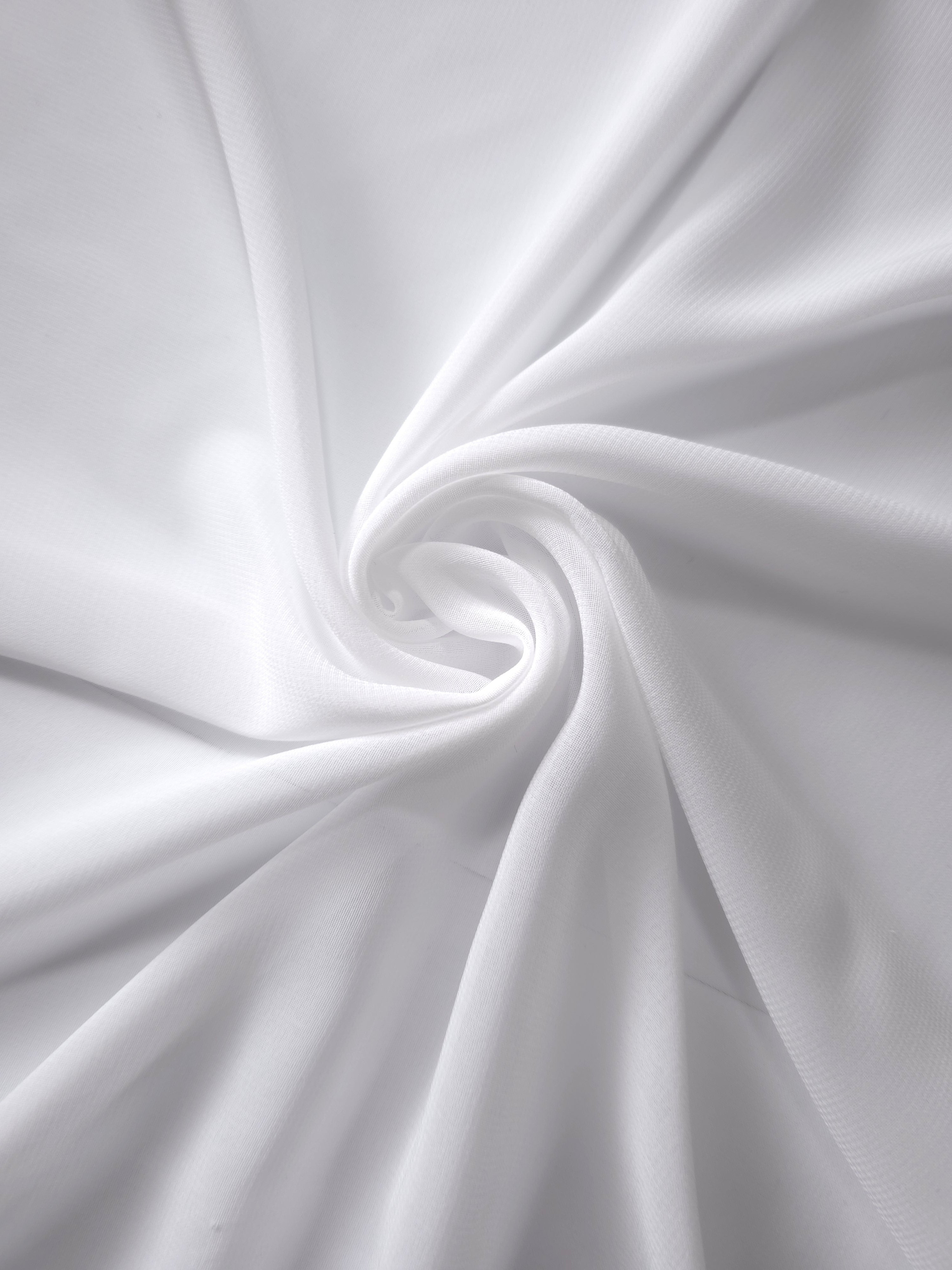 Optic White silky chiffon stretch fabric in cascading folds, showing fluidity for wedding gowns, flowing skirts and ceremonial overlays.