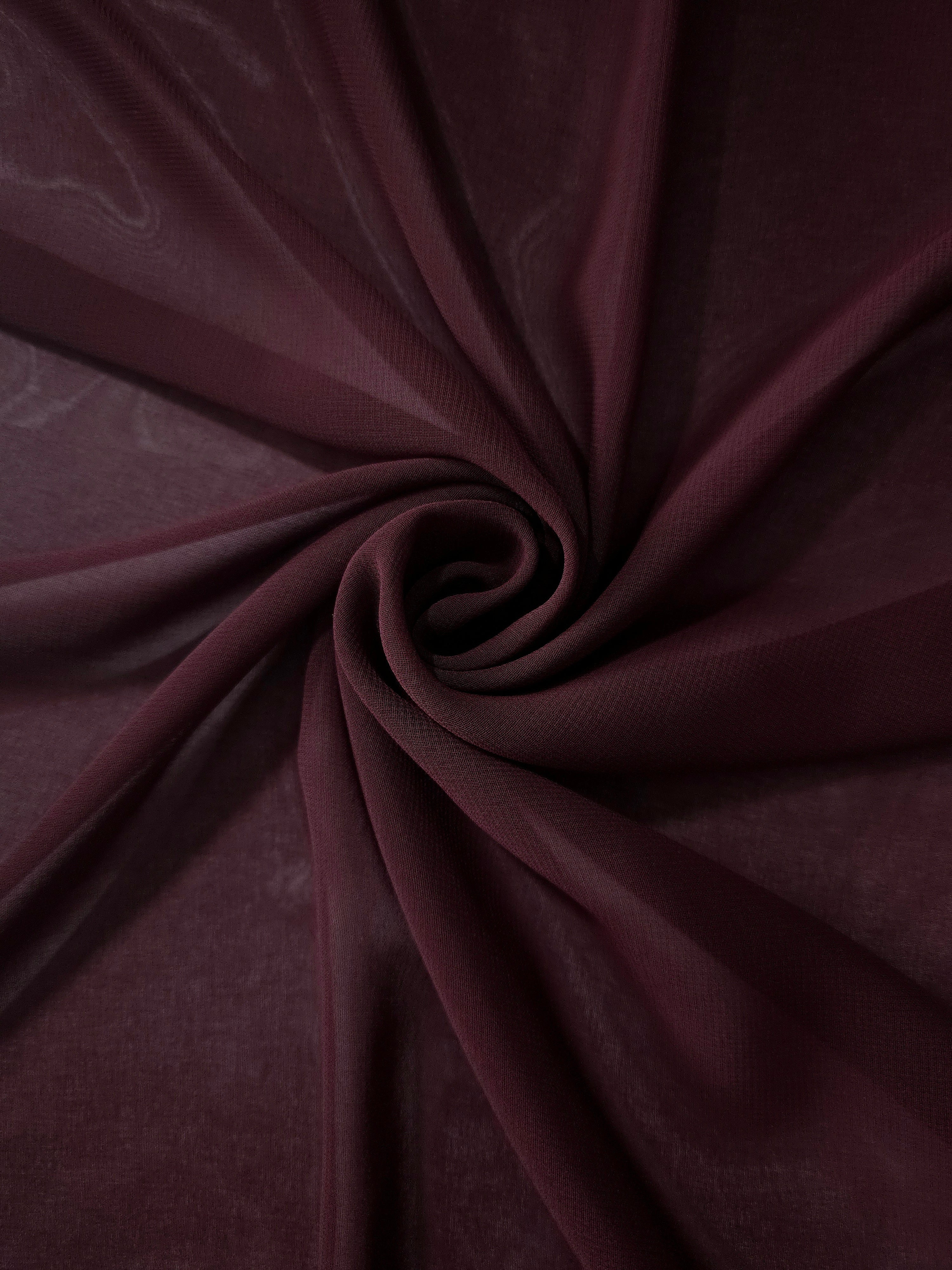 Circular drape of Oxblood Burgundy stretch chiffon highlights graceful flow for scarves, gathered dress layers and romantic shoulder drapes.