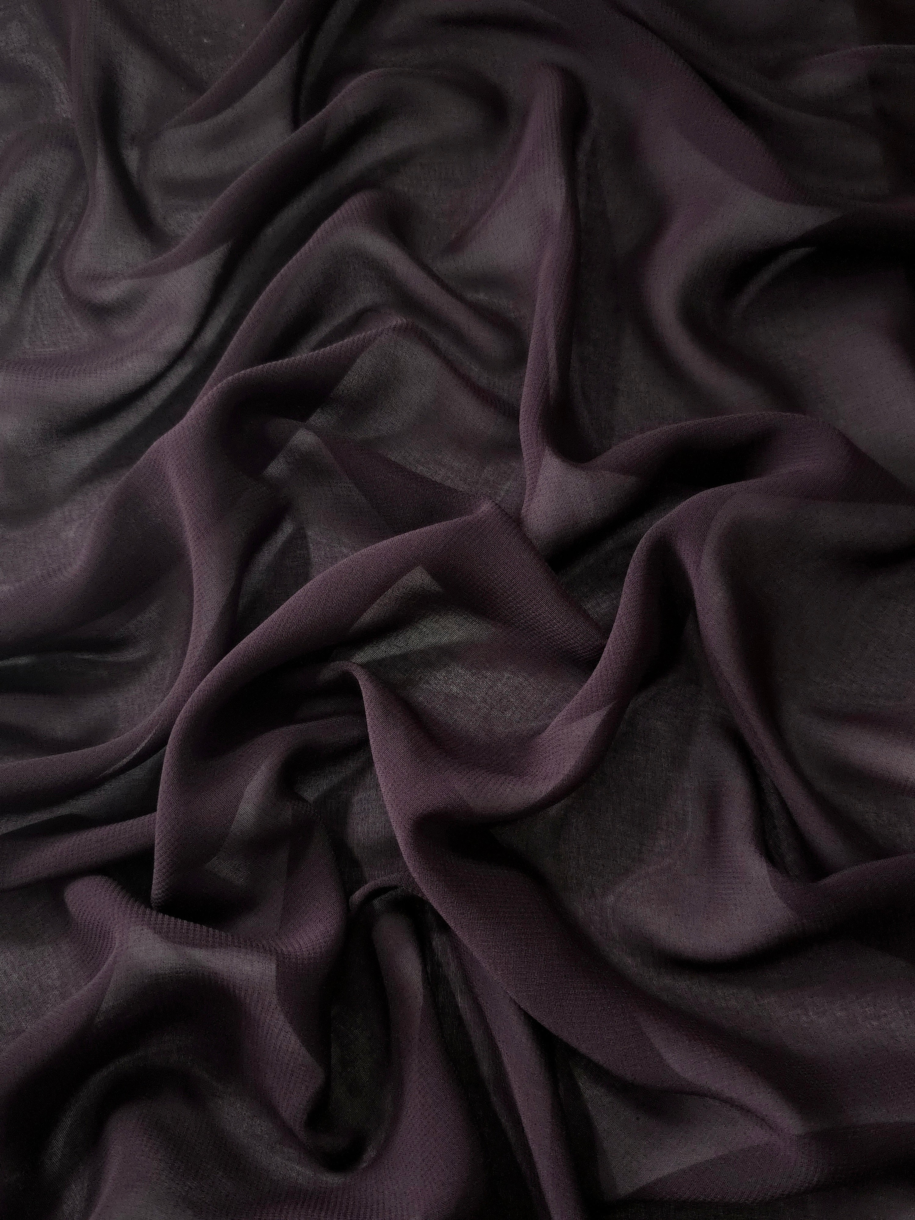 Draped Smoky Plum silky stretch chiffon with flowing folds, ideal for flowing gowns, tiered skirts and elegant layered looks.