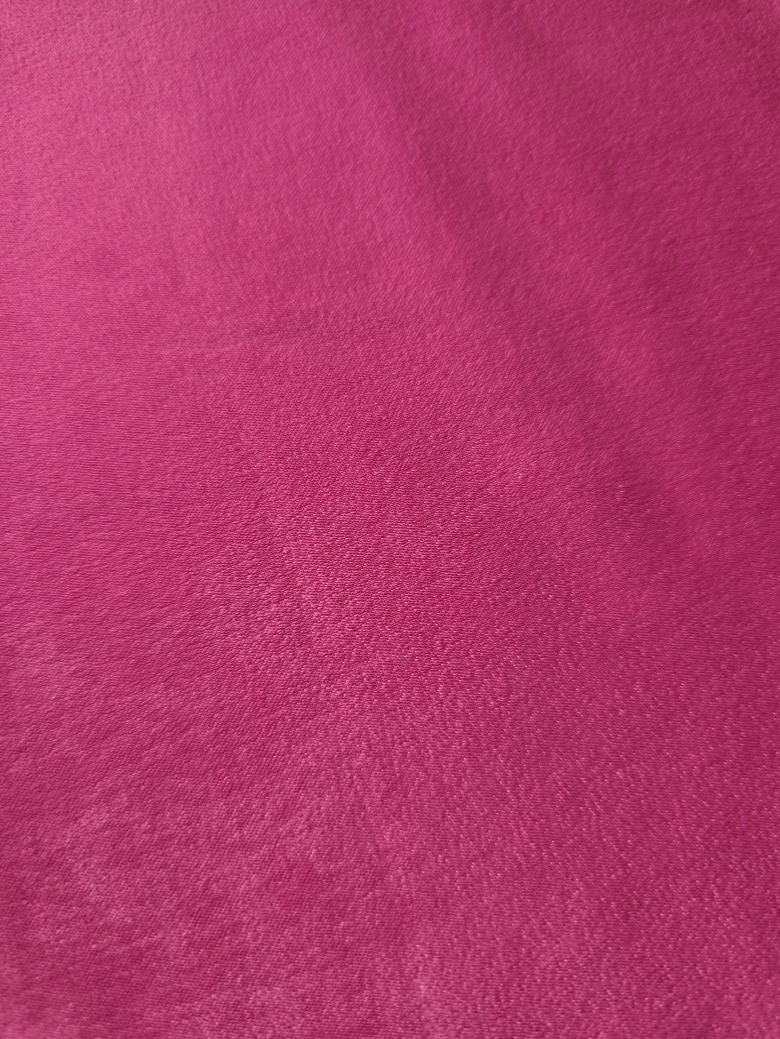 Soft-touch Raspberry Pink polyamide fabric with fluid drape