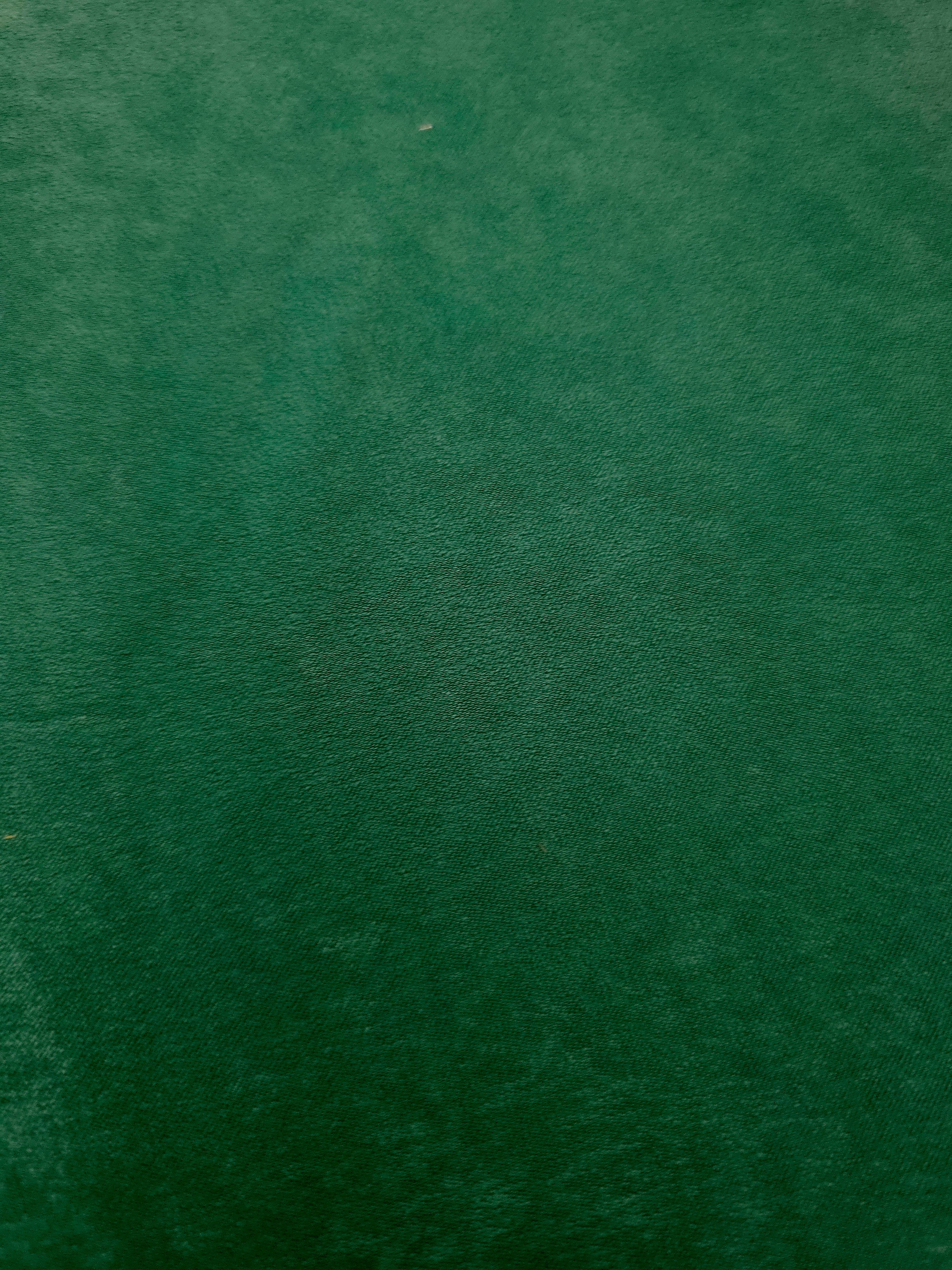 Soft-touch Emerald Green polyamide fabric with fluid drape
