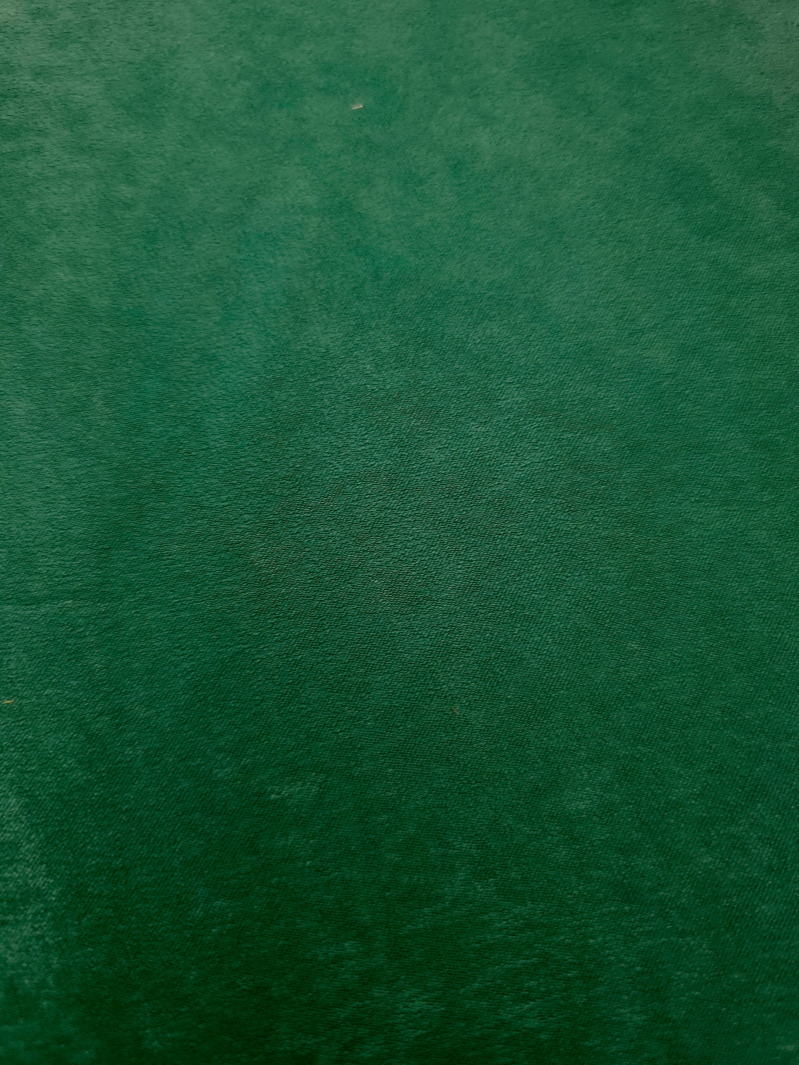Soft-touch Emerald Green polyamide fabric with fluid drape