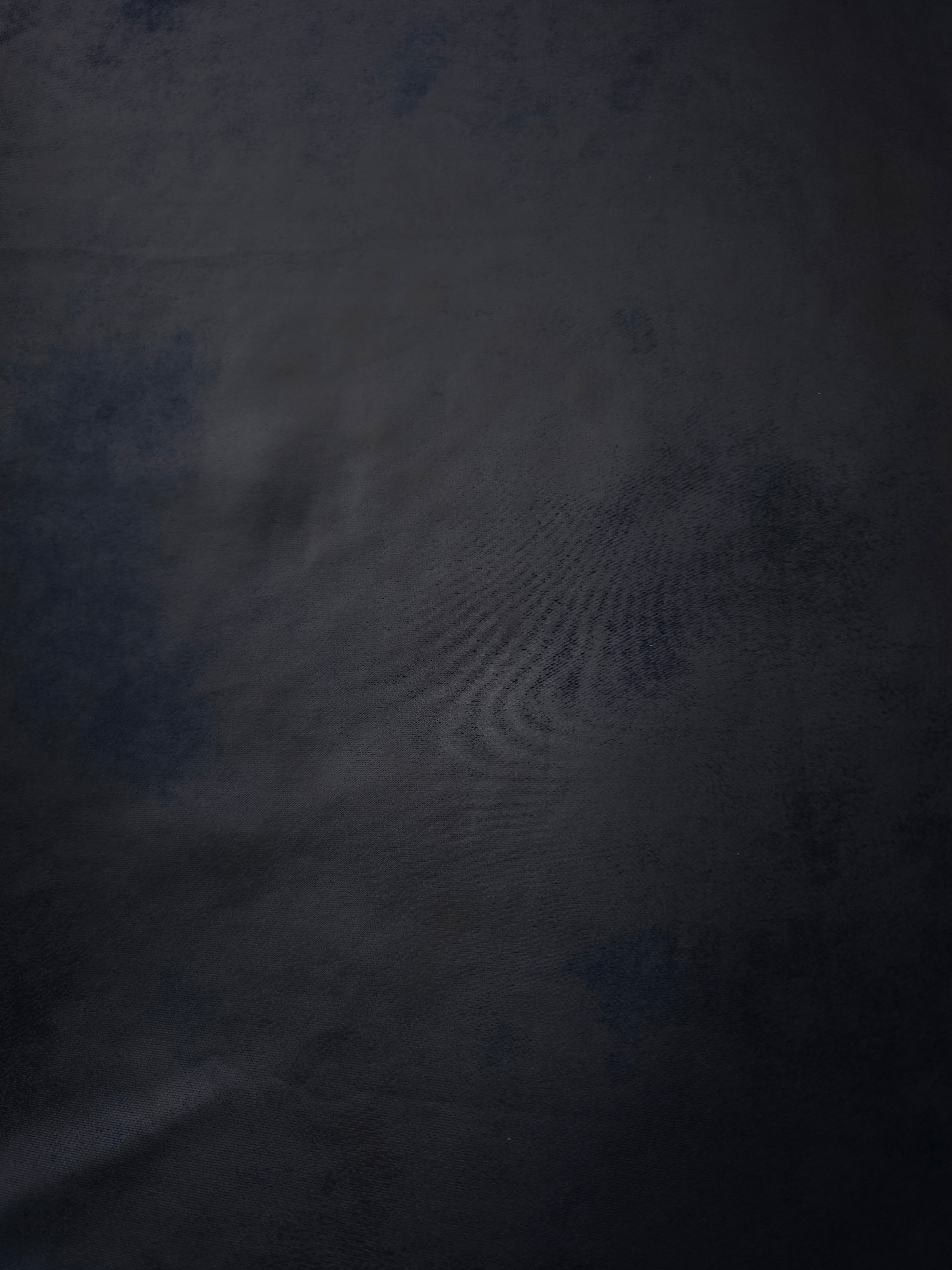 Close texture view of midnight navy soft faux leather stretch fabric, ideal for corset tops, fitted dresses and sleek garment panels.