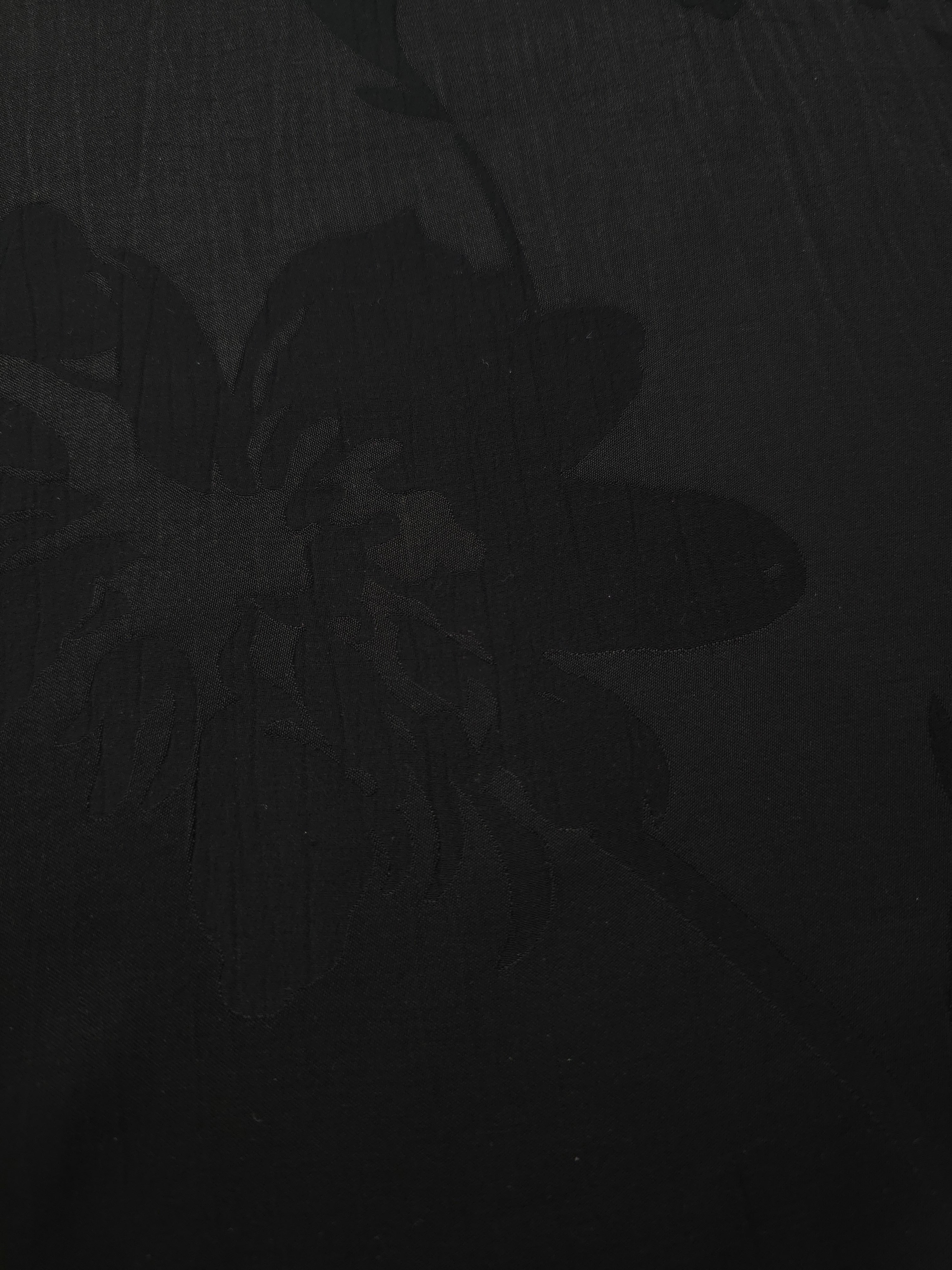 Close-up of Big Flower self-jacquard motif on silky tonal viscose fabric