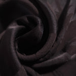 Close-up of draped Big Flower tonal jacquard fabric showing silky texture and fold detail