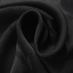 Close-up of draped Big Flower tonal jacquard fabric showing silky texture and fold detail