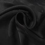 Big Flower self-jacquard tonal viscose fabric draped, showing silky fluid movement