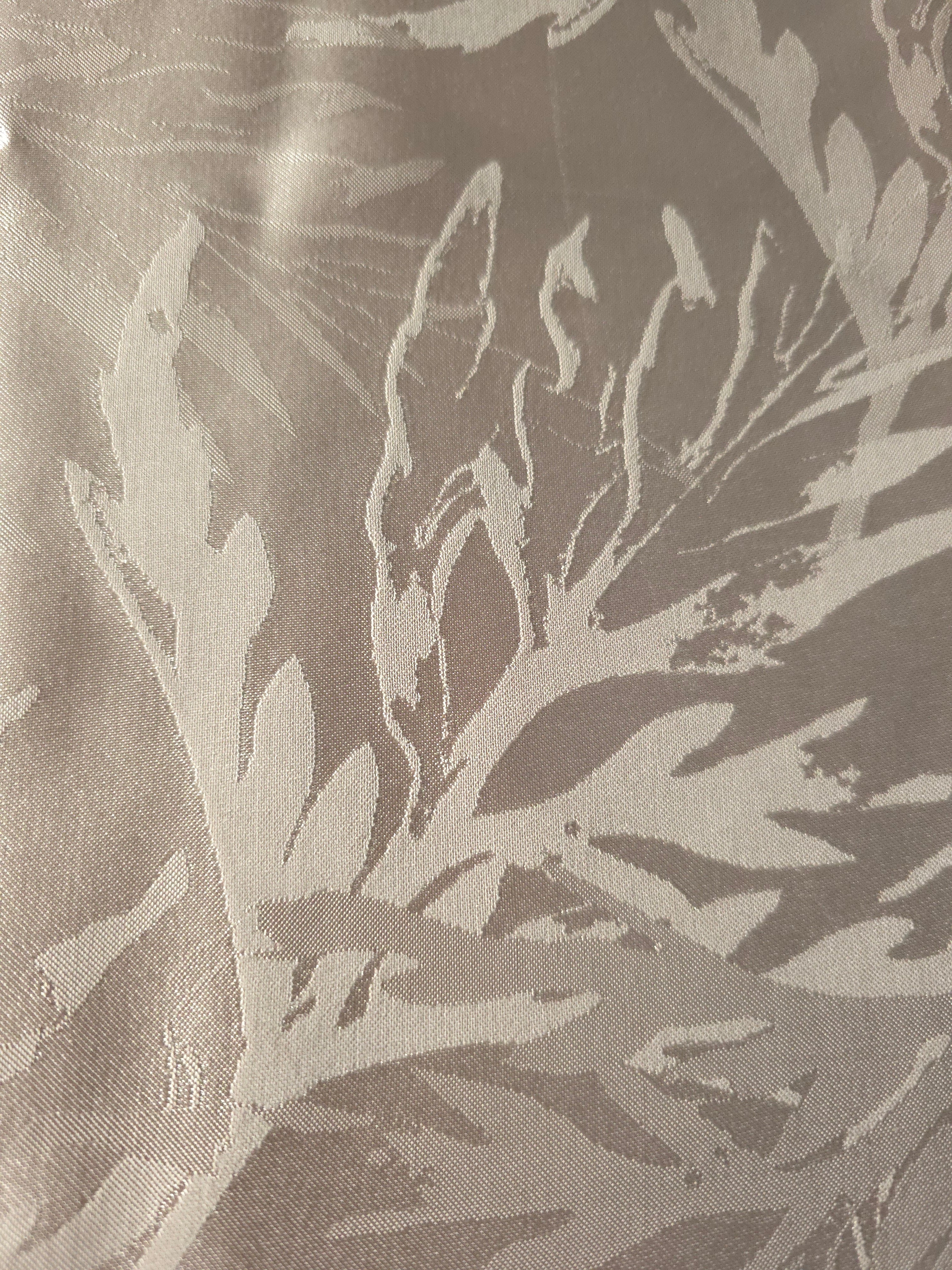 Close-up of Branch self-jacquard motif on silky tonal viscose fabric