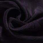 Close-up of draped Brush tonal jacquard fabric showing silky texture and fold detail