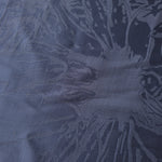 Close-up of Daisy self-jacquard motif on silky tonal viscose fabric