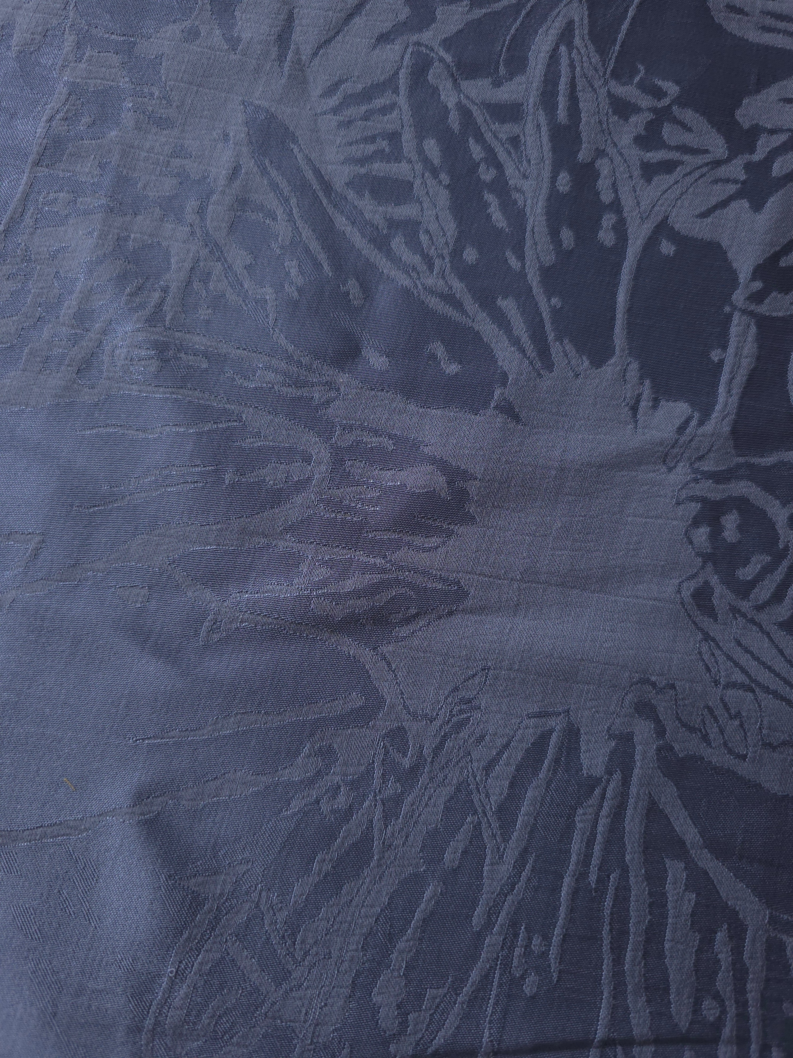 Close-up of Daisy self-jacquard motif on silky tonal viscose fabric