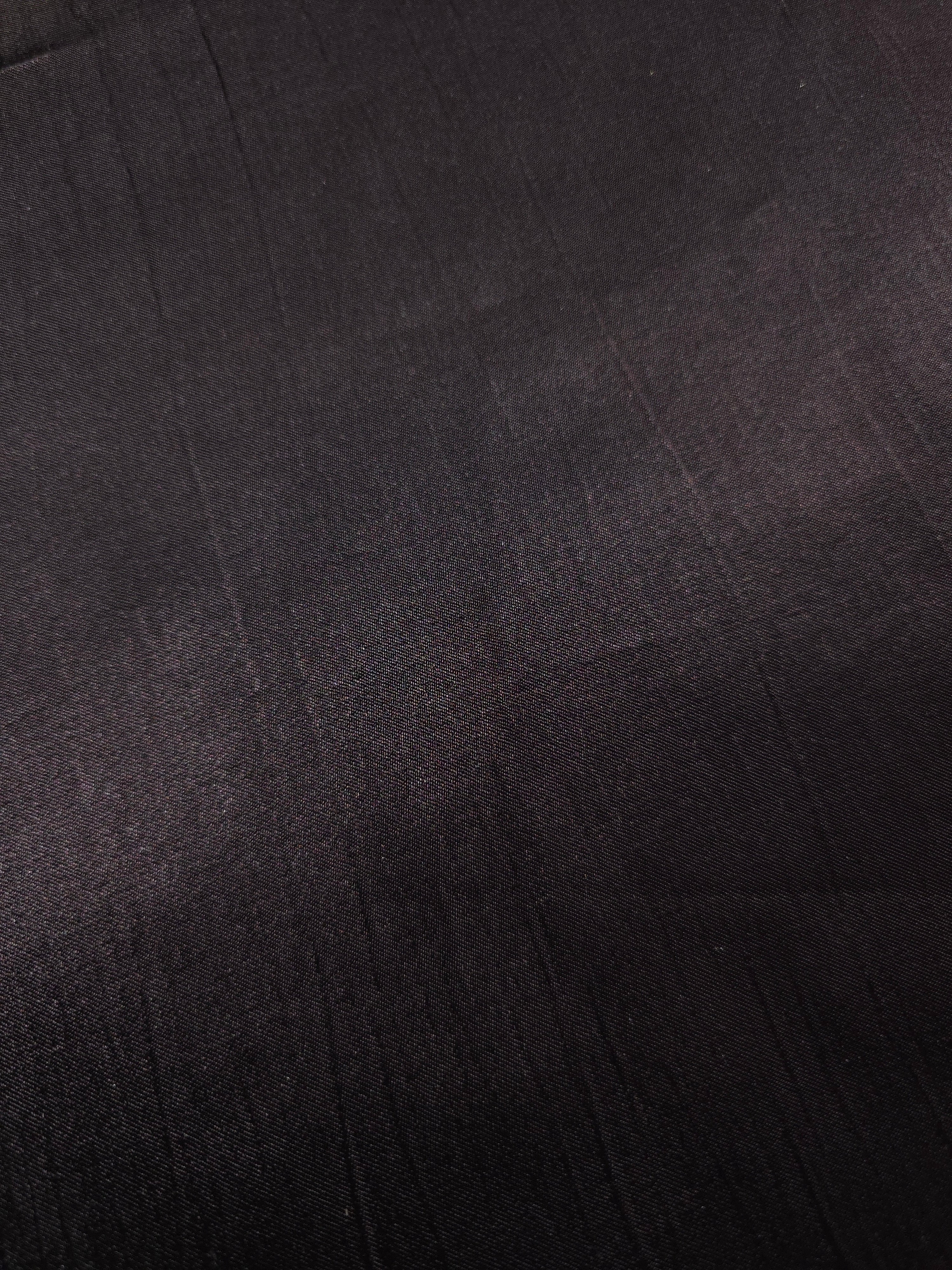 Close-up of Flat self-jacquard motif on silky tonal viscose fabric