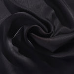 Flat self-jacquard tonal viscose fabric draped, showing silky fluid movement