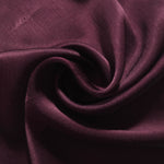 Flat self-jacquard tonal viscose fabric draped, showing silky fluid movement