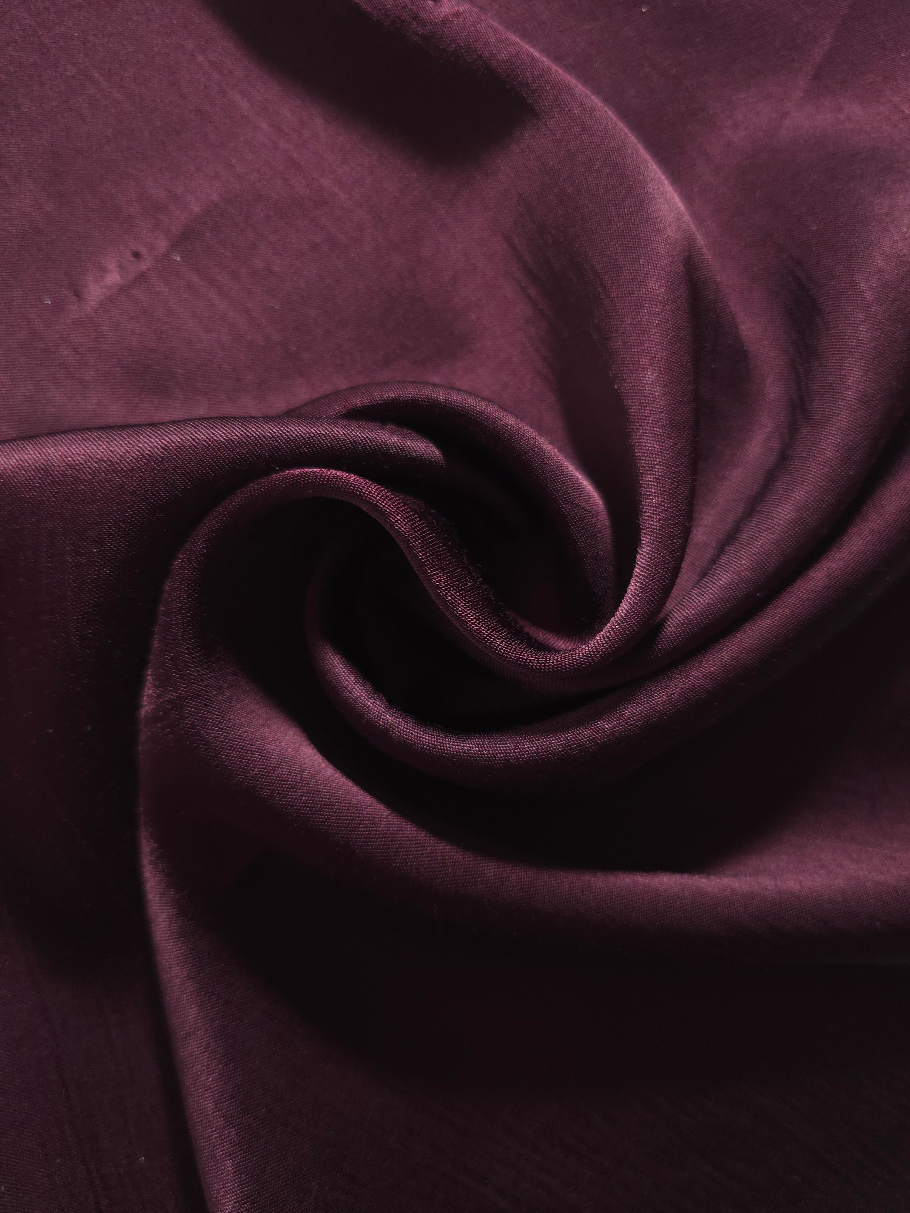 Flat self-jacquard tonal viscose fabric draped, showing silky fluid movement