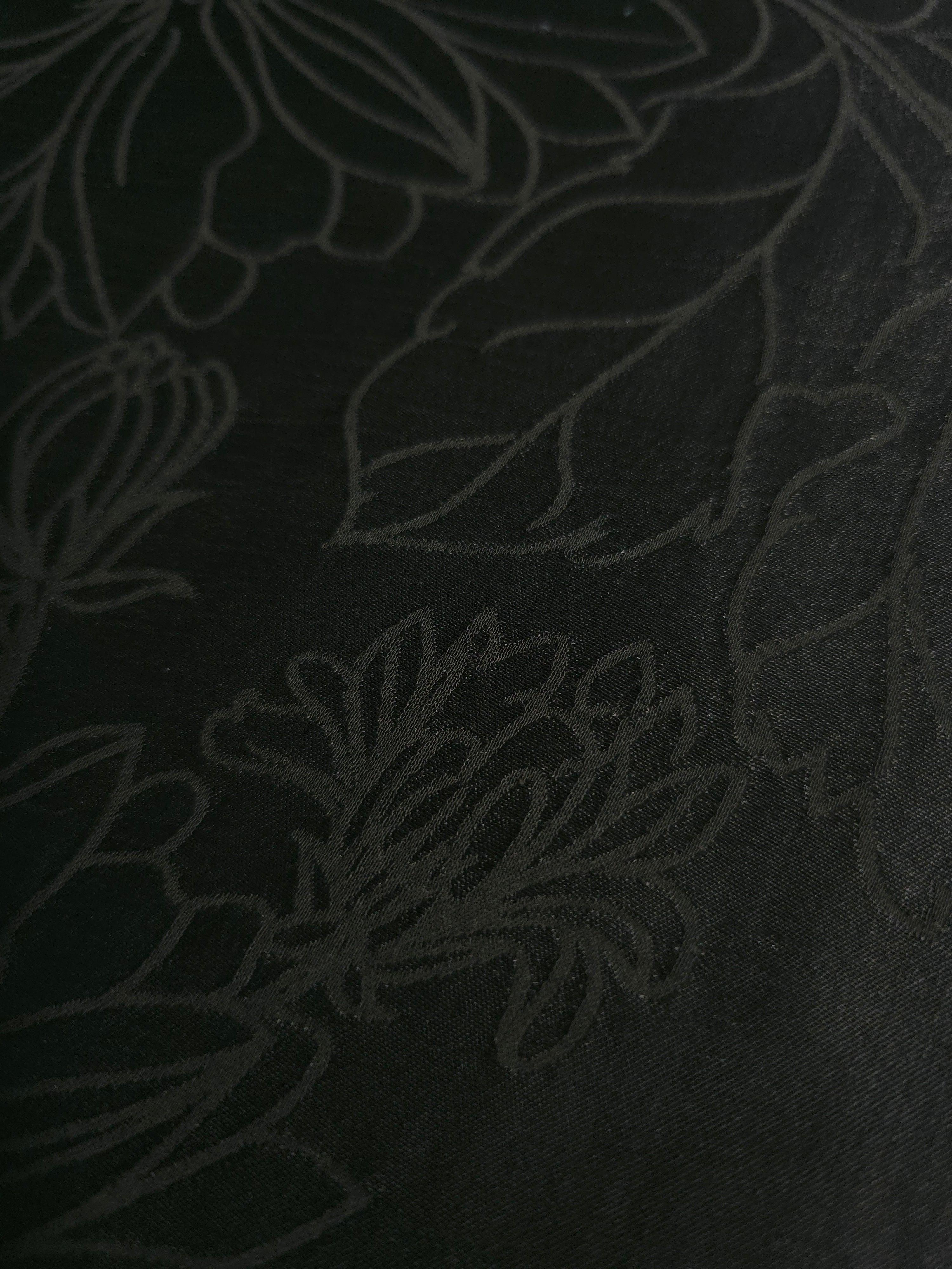 Close-up of Floral self-jacquard motif on silky tonal viscose fabric