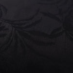 Close-up of Lily Flower self-jacquard motif on silky tonal viscose fabric