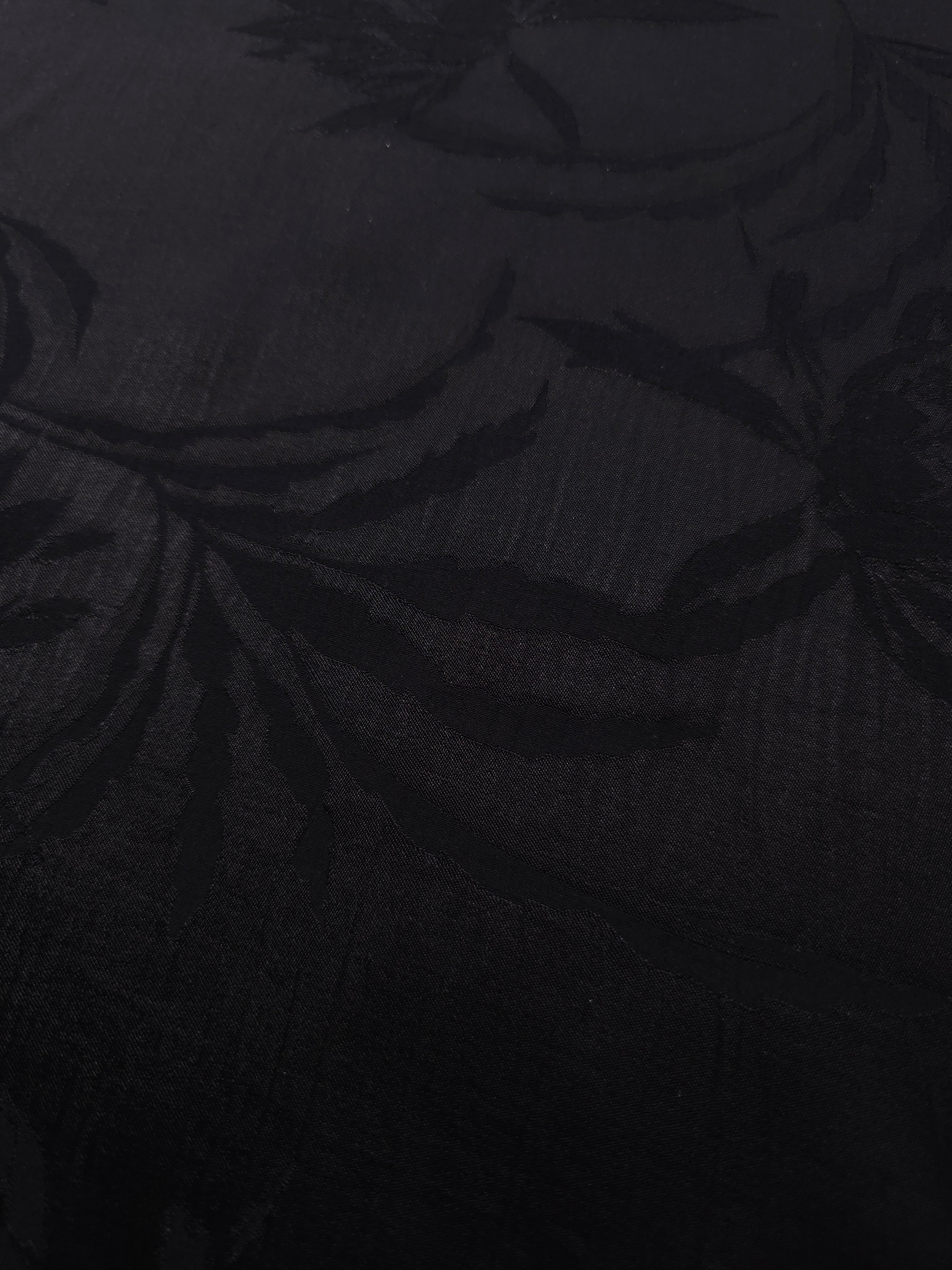 Close-up of Lily Flower self-jacquard motif on silky tonal viscose fabric