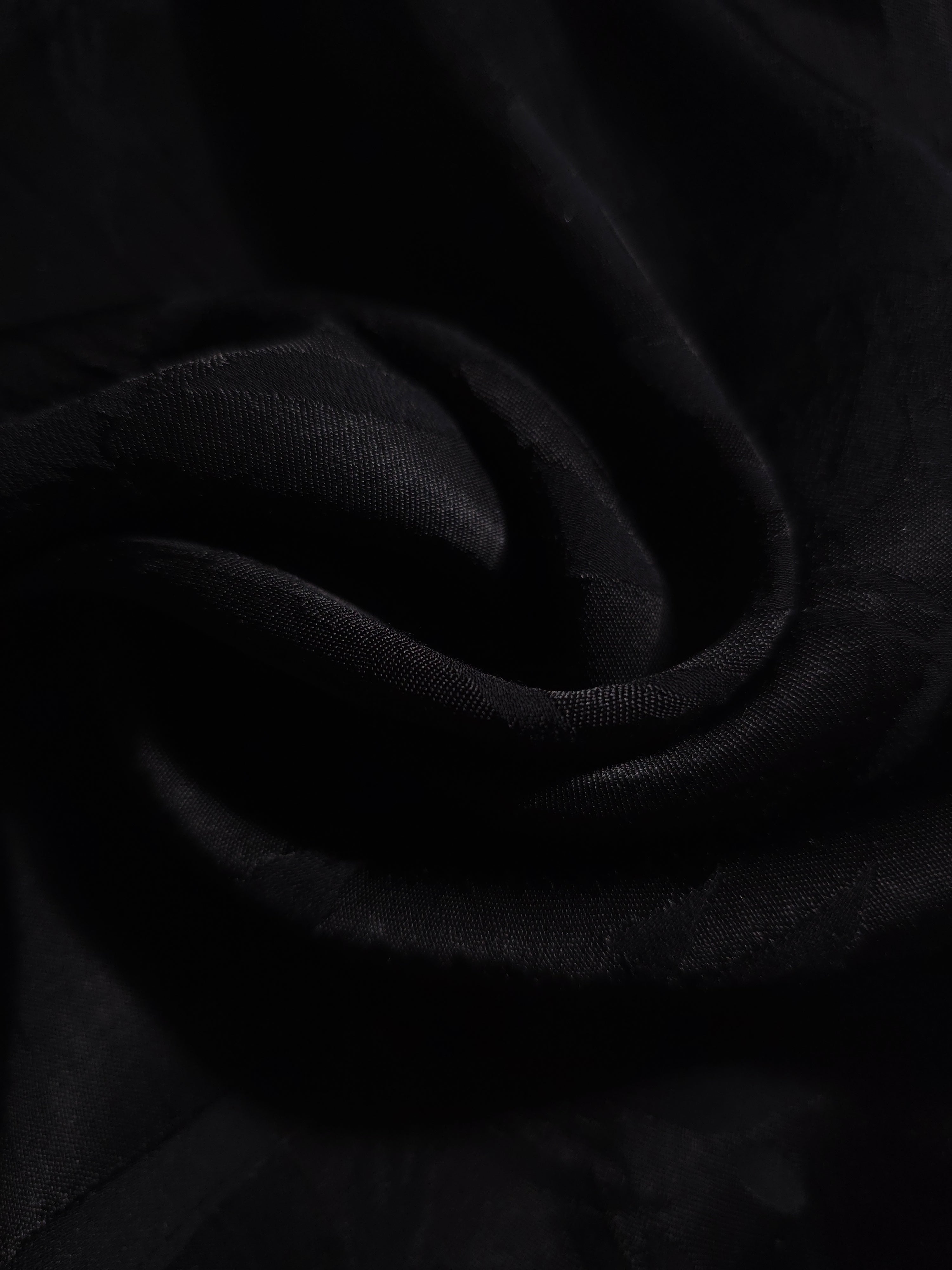 Close-up of draped Lily Flower tonal jacquard fabric showing silky texture and fold detail