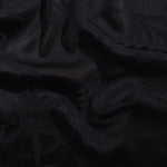 Lily Flower tonal viscose jacquard fabric in a wave fold, showing silky sheen
